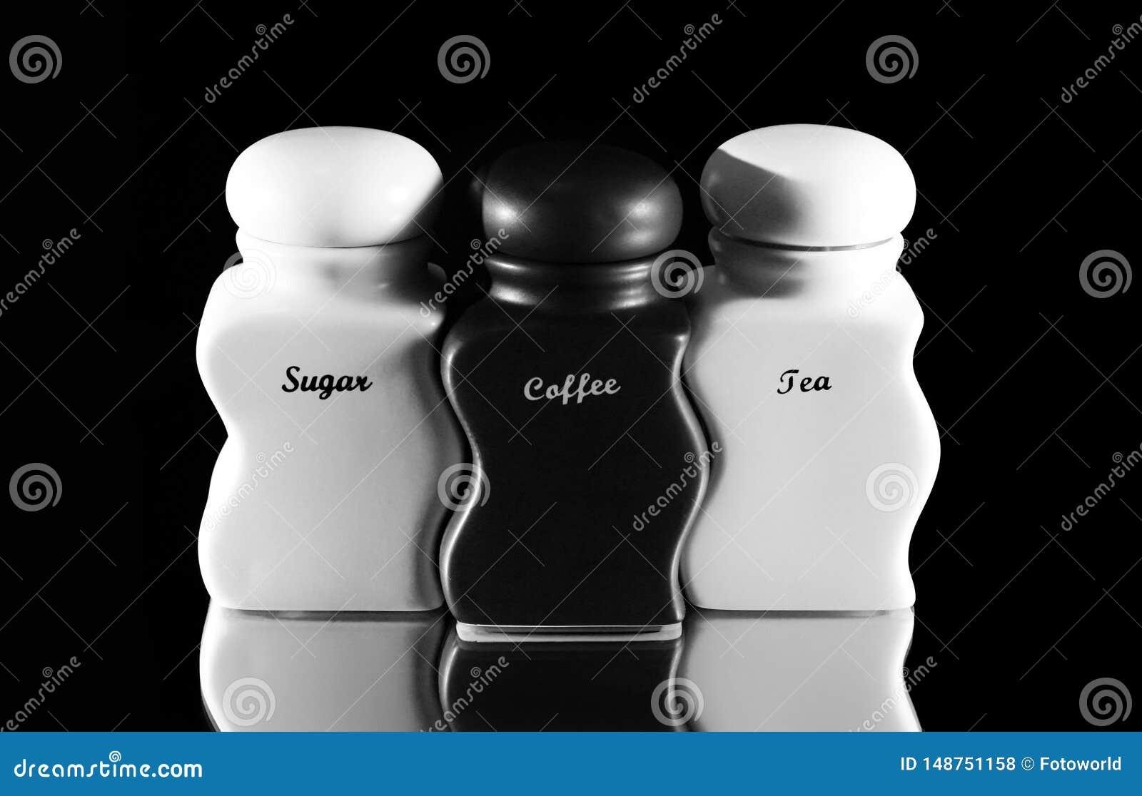 Capacities for Spices Sugar, Coffee, Tea Set Black Stock Photo