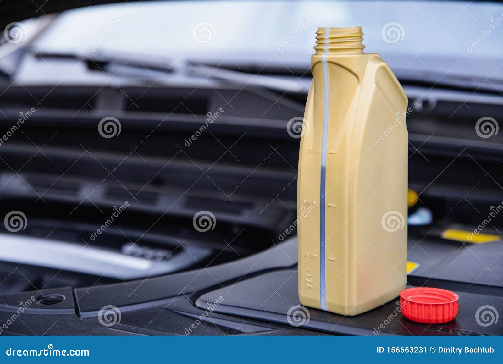 Capacity with Engine Oil Near the Car Engine Stock Image Image of