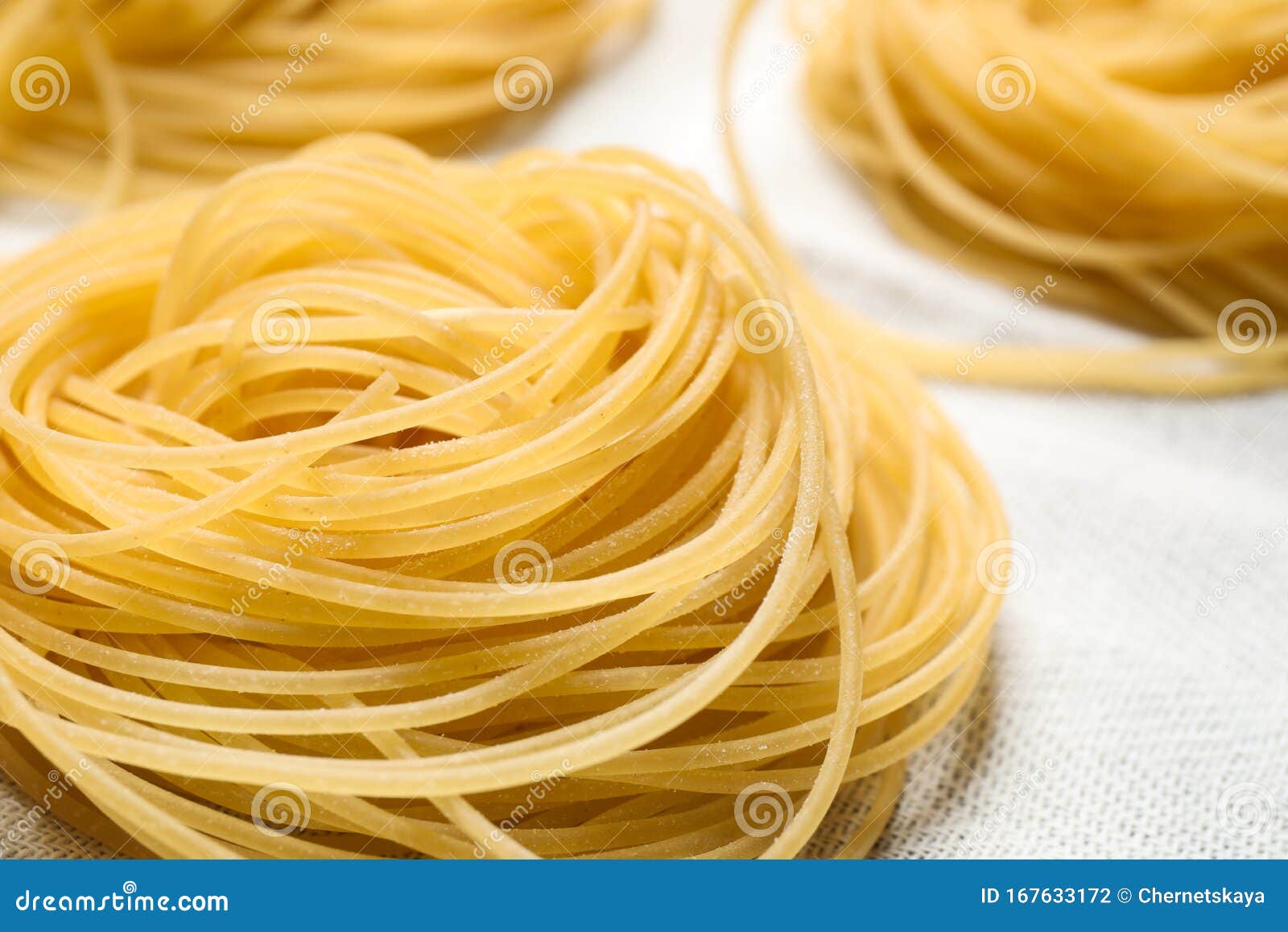 Capellini Pasta on White Tablecloth, Closeup Stock Photo Image of cooking, making 167633172