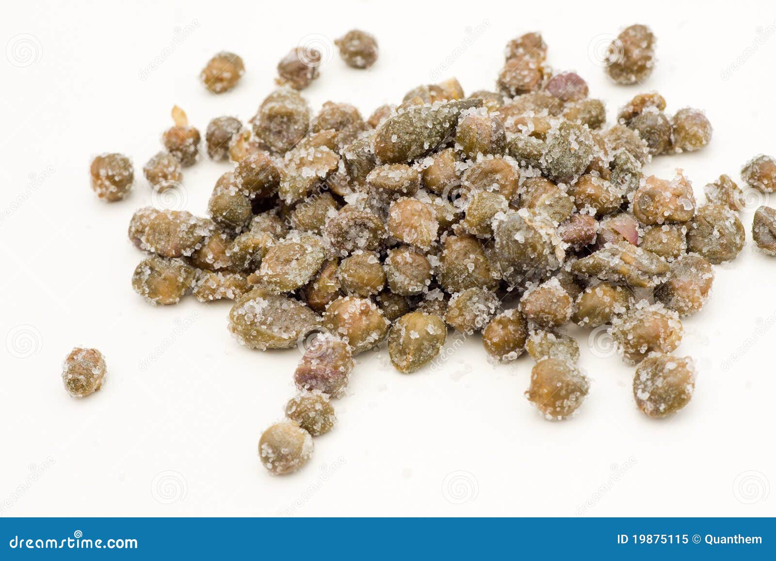 Capers under salt stock image. Image of isolated, salt 19875115