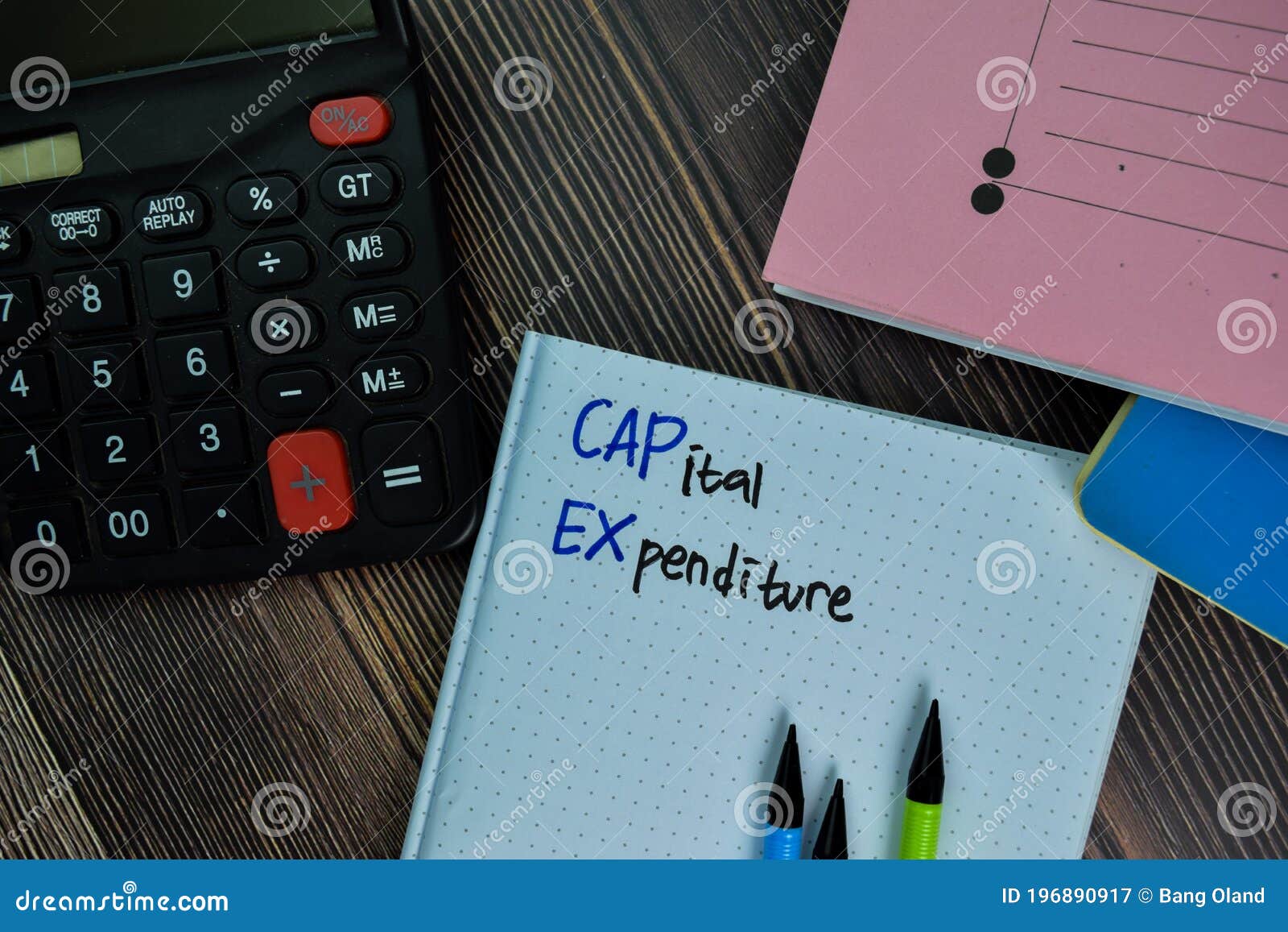 Capital Expenditure Write on a Book Isolated on Office Desk Stock Image