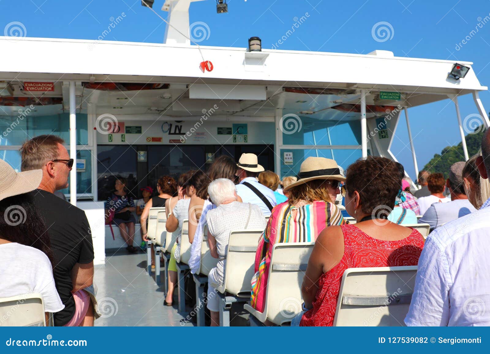 CAPRI, ITALY - JULY 4, 2018: People Sitting on the Ferry Boat an ...