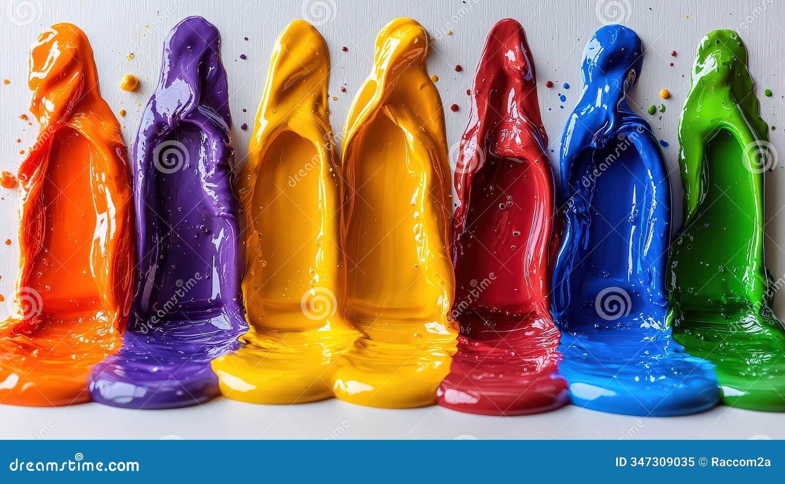 colorful paint poured creating artistic drips on canvas surface