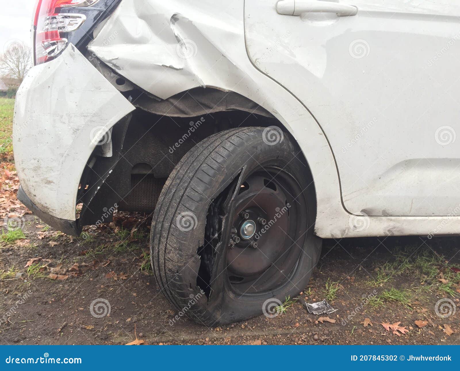 A Car Accident in Which One Car Lost One Wheel and the Back of the Car
