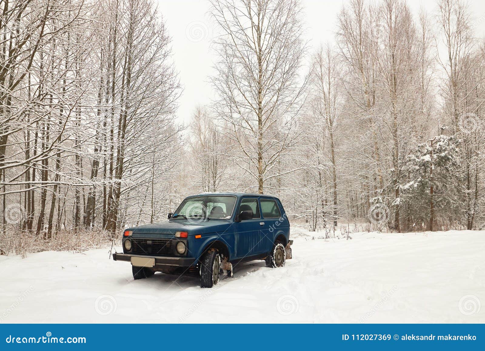Car Allterrain Vehicle in Winter in the Forest. Stock Image Image of