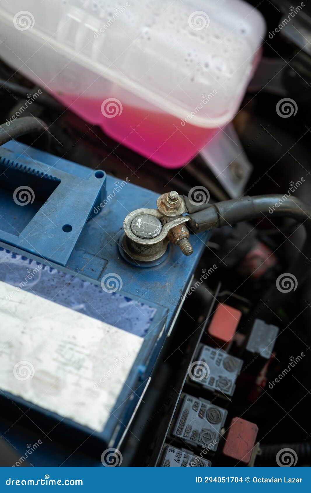 Car Battery Terminal and Lead Cable Mounted Inside the Engine