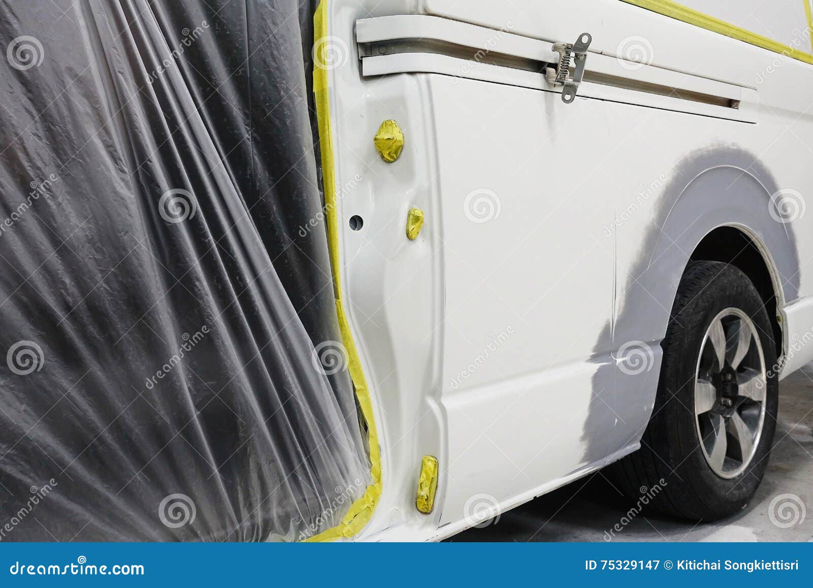 Car Body Work Auto Repair Paint after the Accident during the Spraying