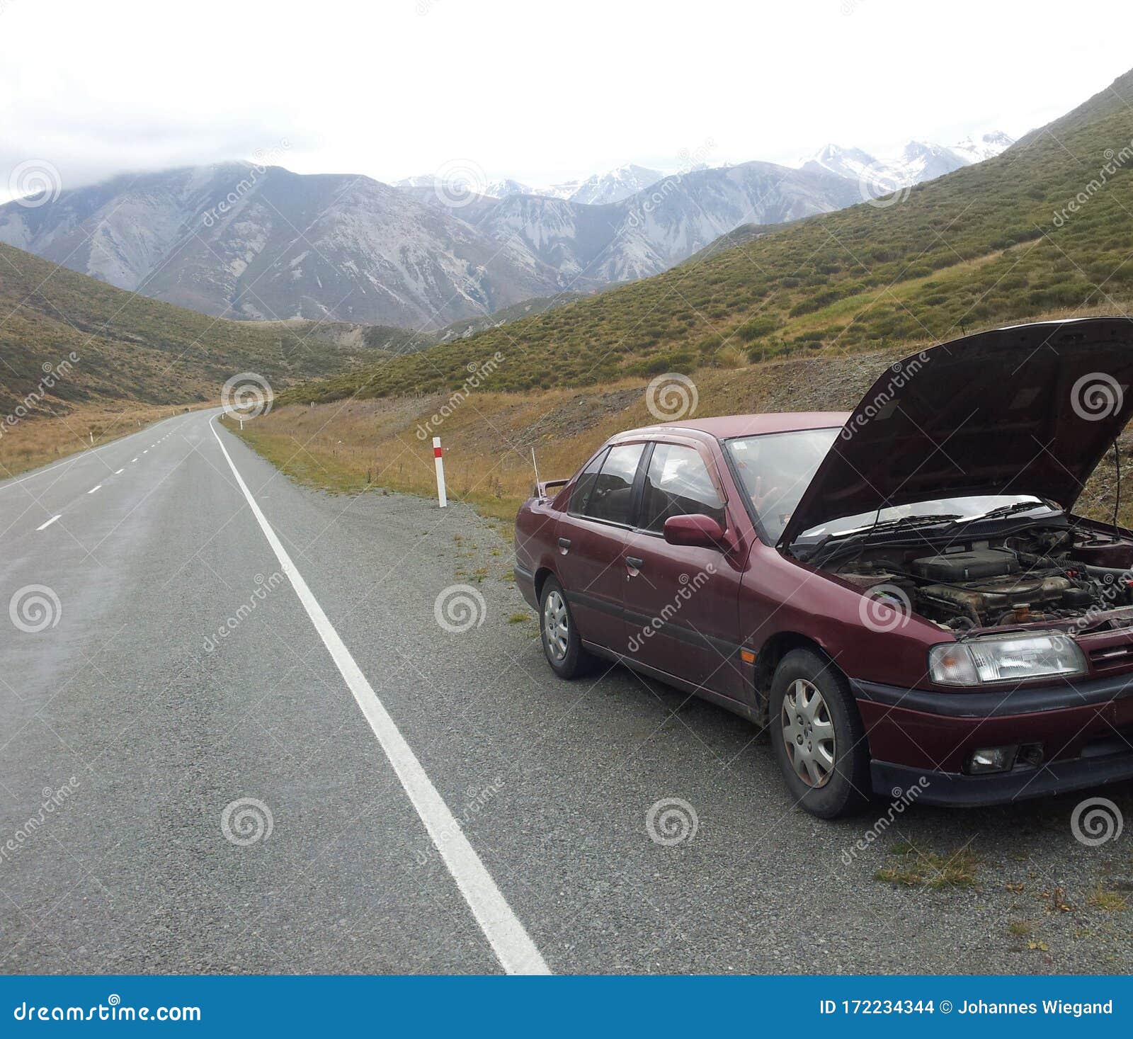 Car Breakdown on the Side of the Empty Road, Mountains in the