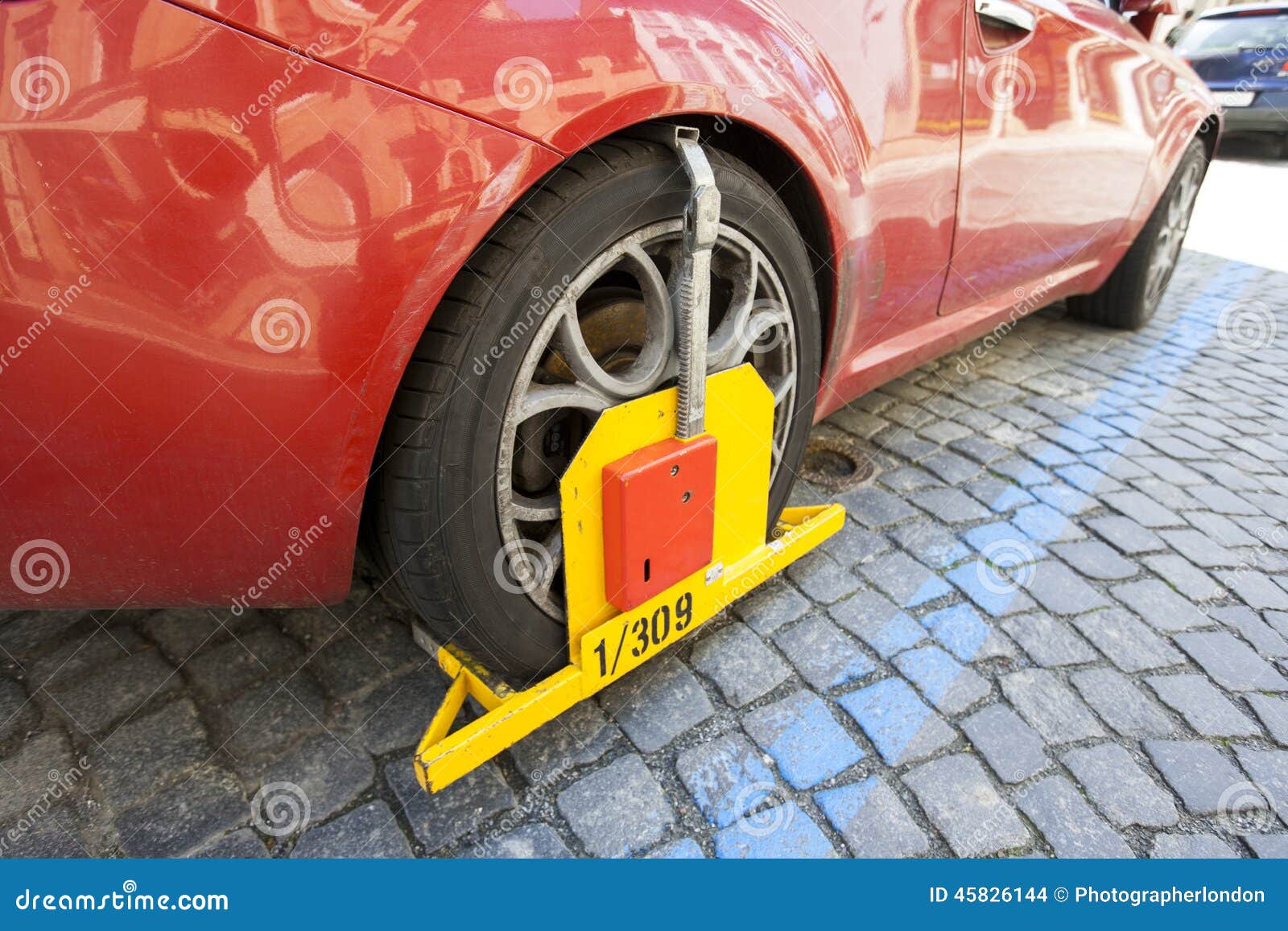 Car Clamped on Cobbled Street Stock Photo Image of parked, czech