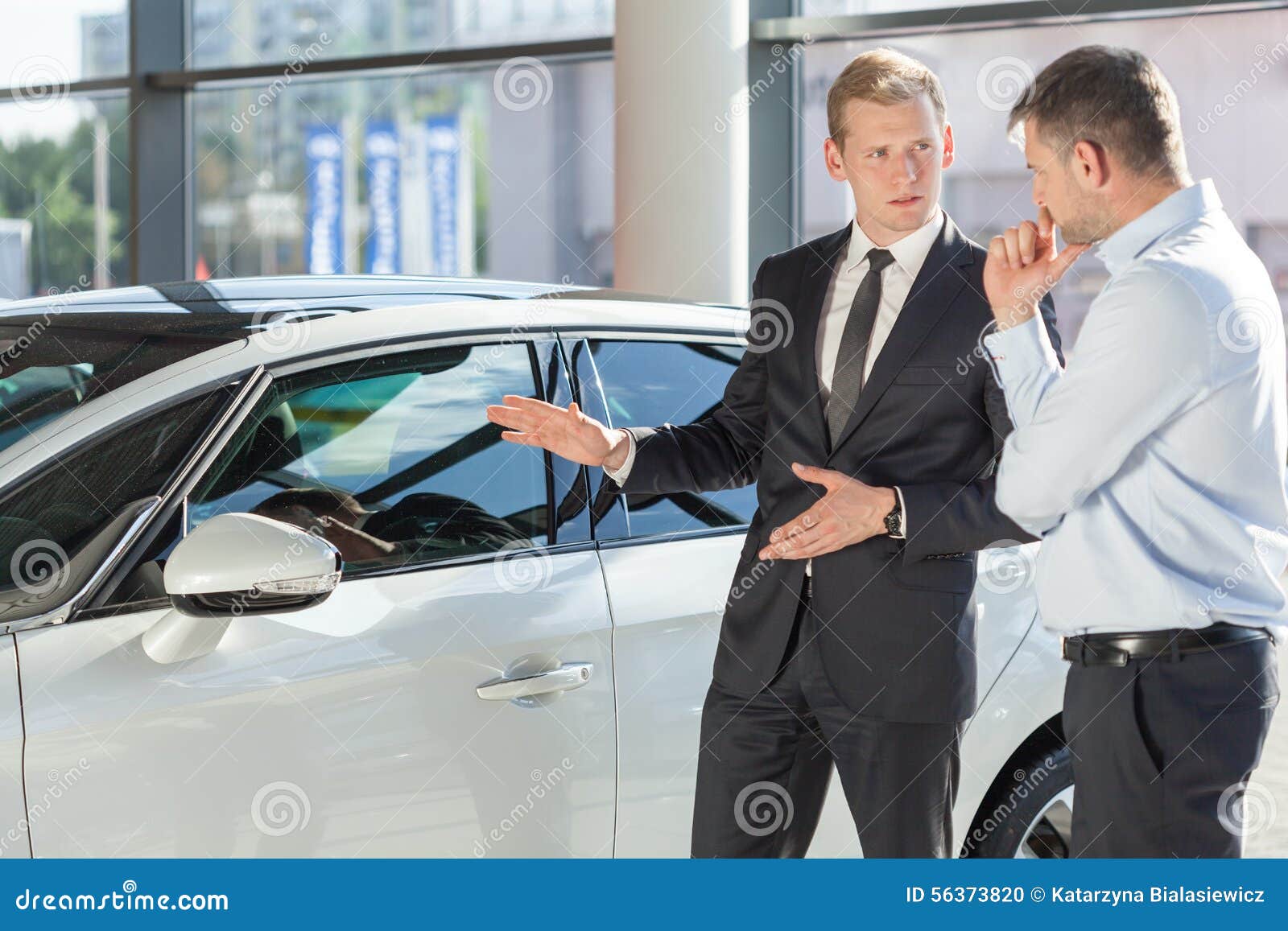 Car dealer showing vehicle stock photo. Image of business ...