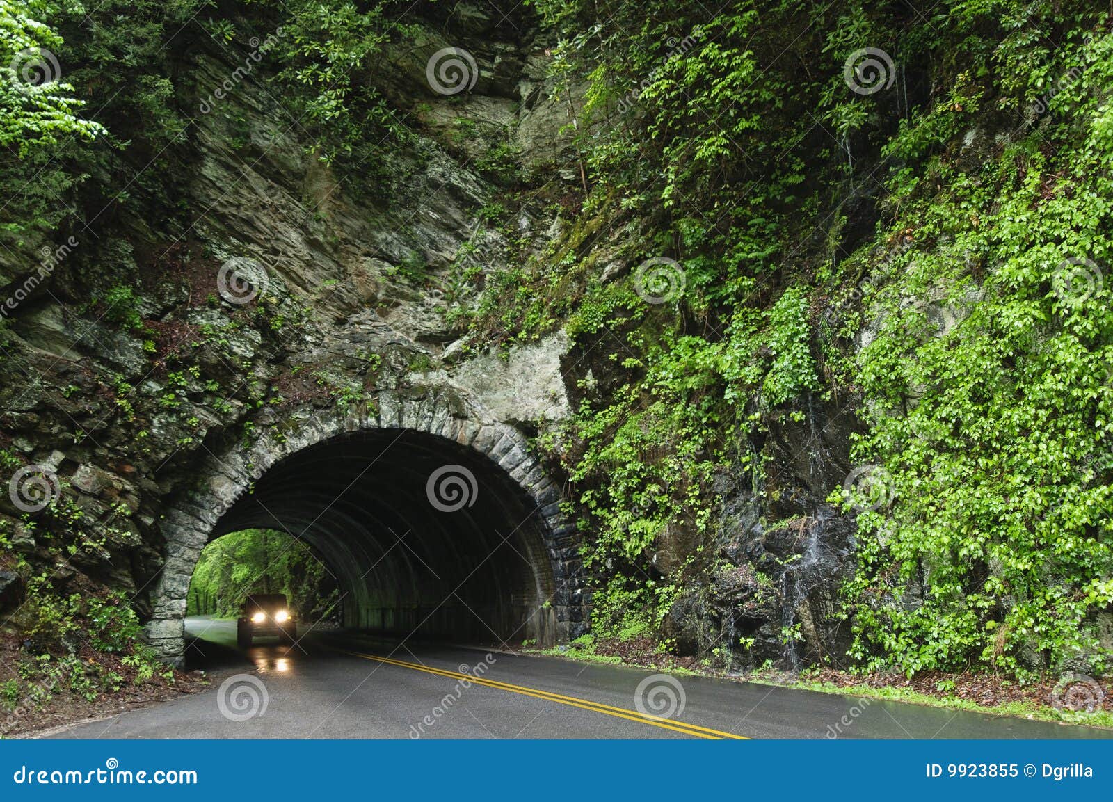 Car driving through tunnel stock image. Image of drive 9923855