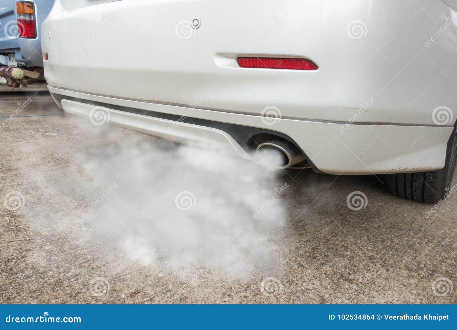 car exhaust pipe comes out strongly of smoke, air pollution concept