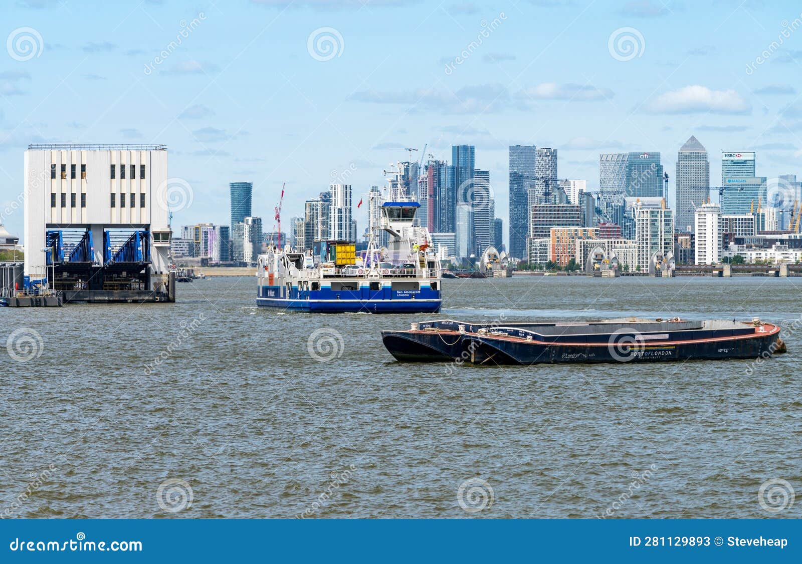 Car Ferry Approaches Woolwich Ferry Terminal on River Thames Editorial
