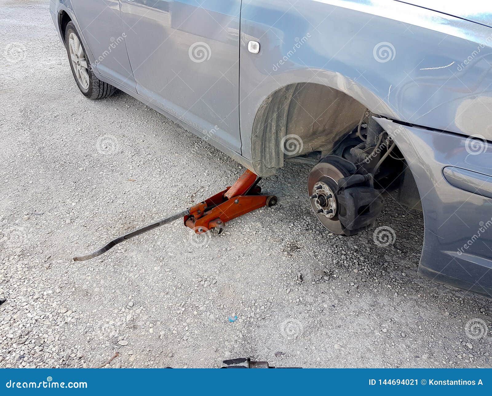 Car Flat Tire Change Replace on the Road Problem Emergency Stock Image