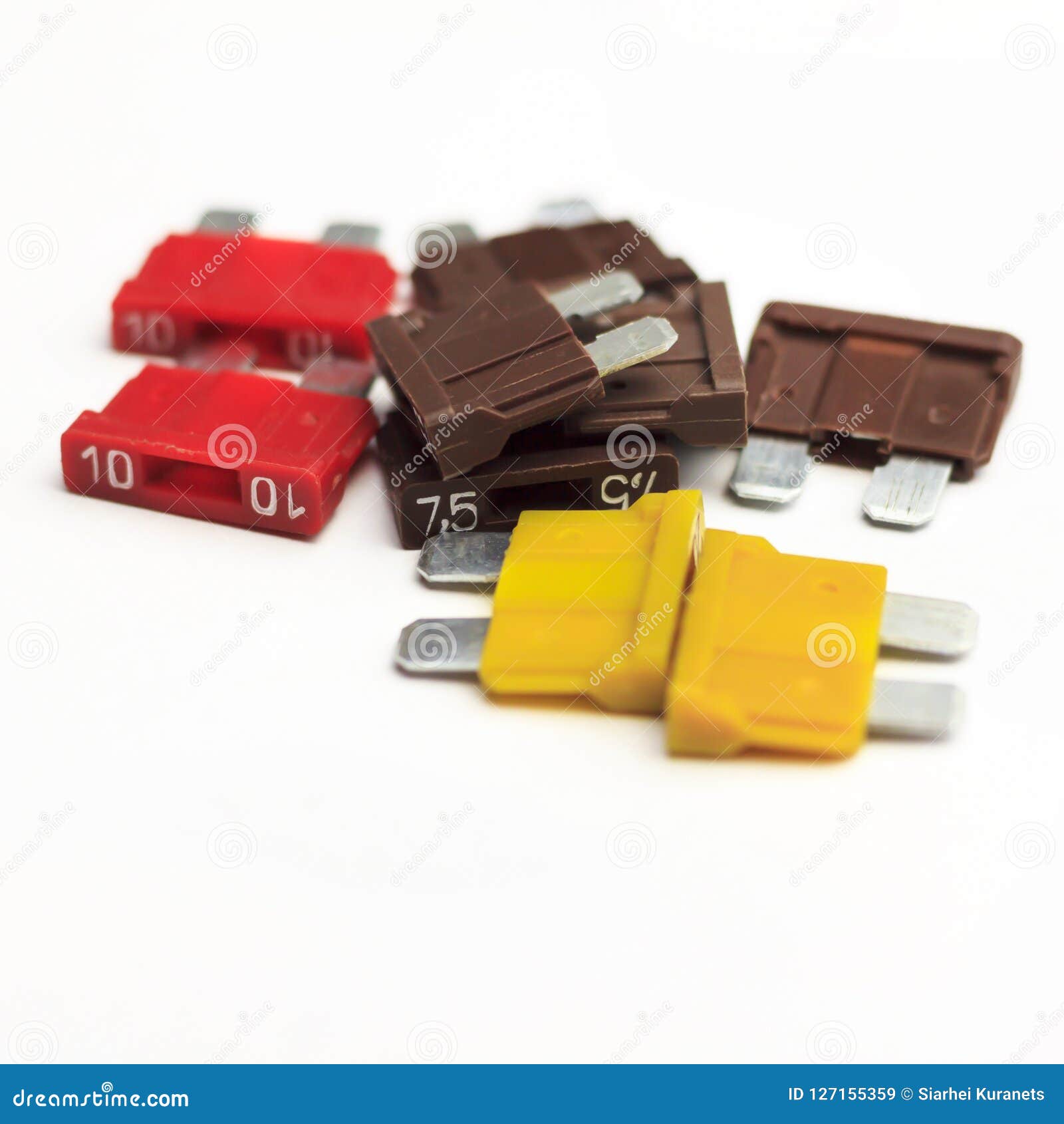 Car Fuse. Red, Yellow, Dark. Closeup. on a White Background Stock