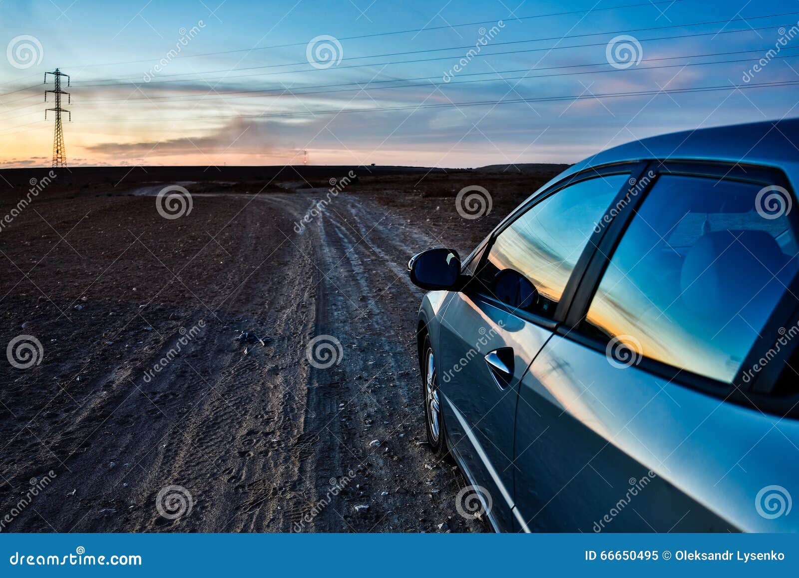 Car goes on stony desert stock image. Image of cliff 66650495