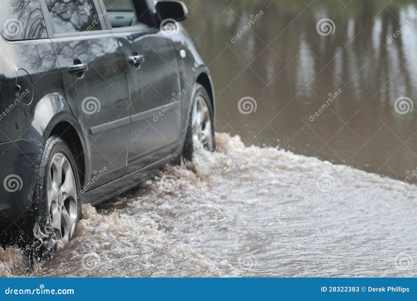 car going through flood