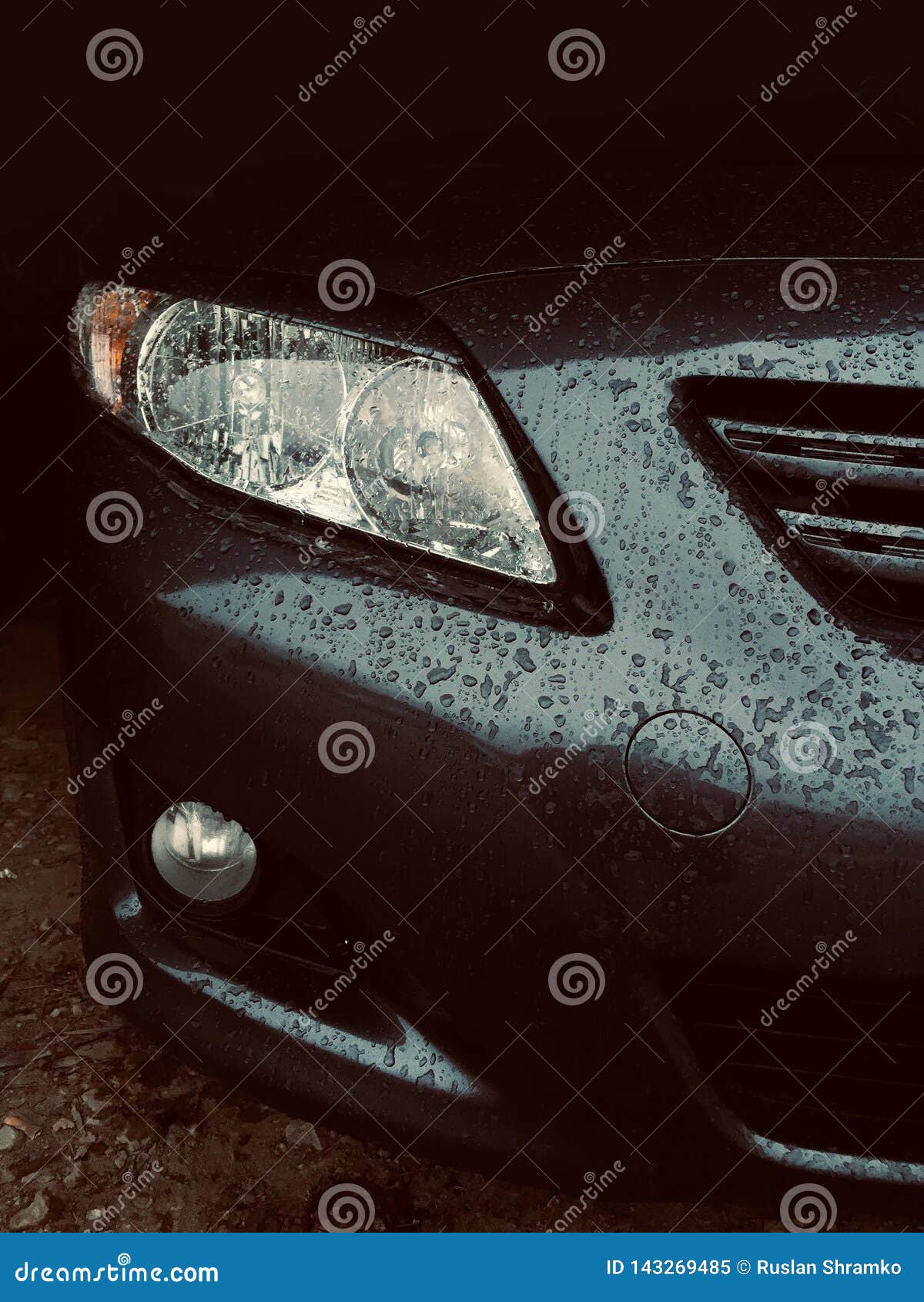 Car Headlight and Bumper Premium Car with Raindrops Stock Image Image