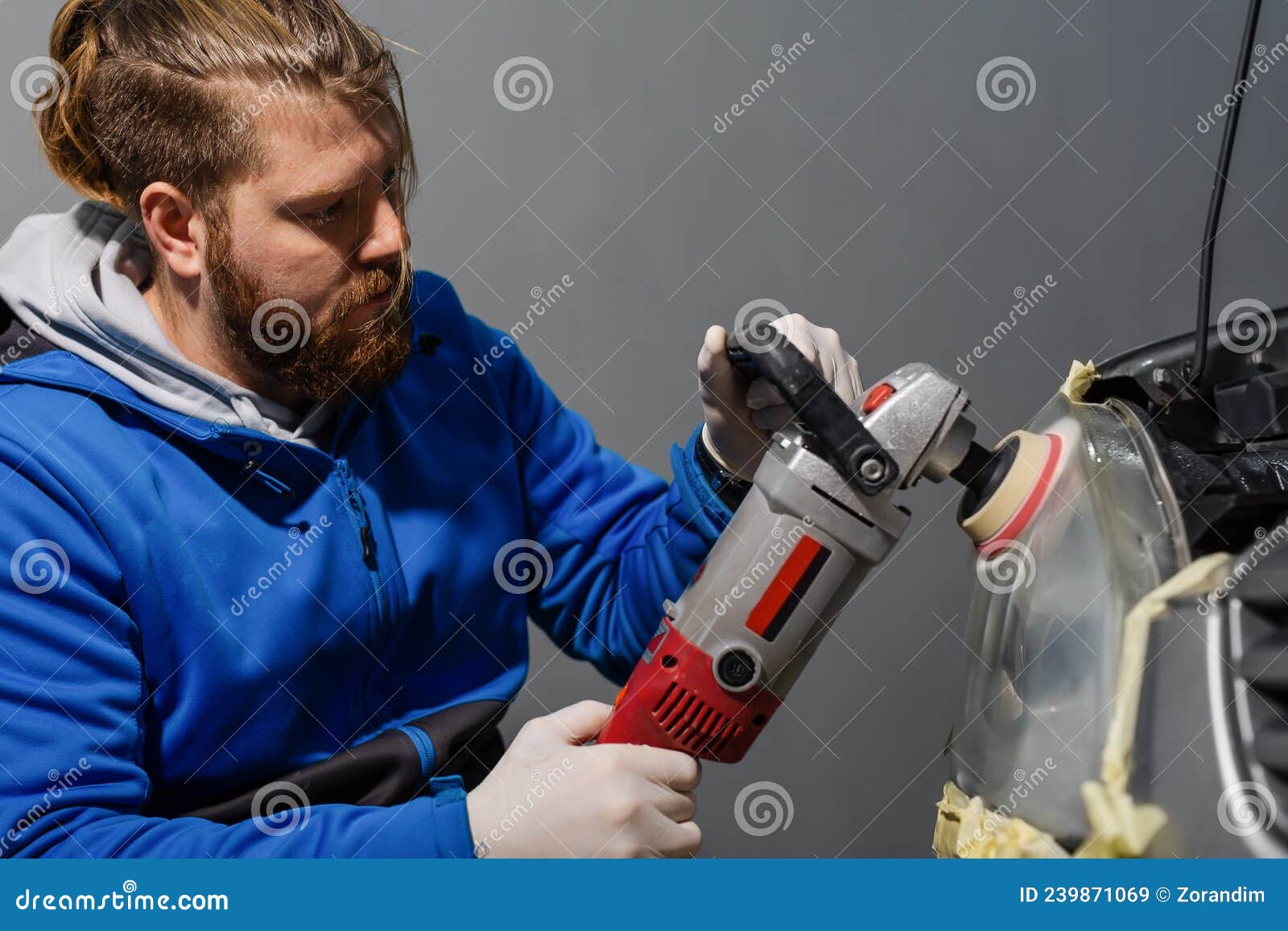 Car Headlight Cleaning with Power Buffer Machine at Service Station