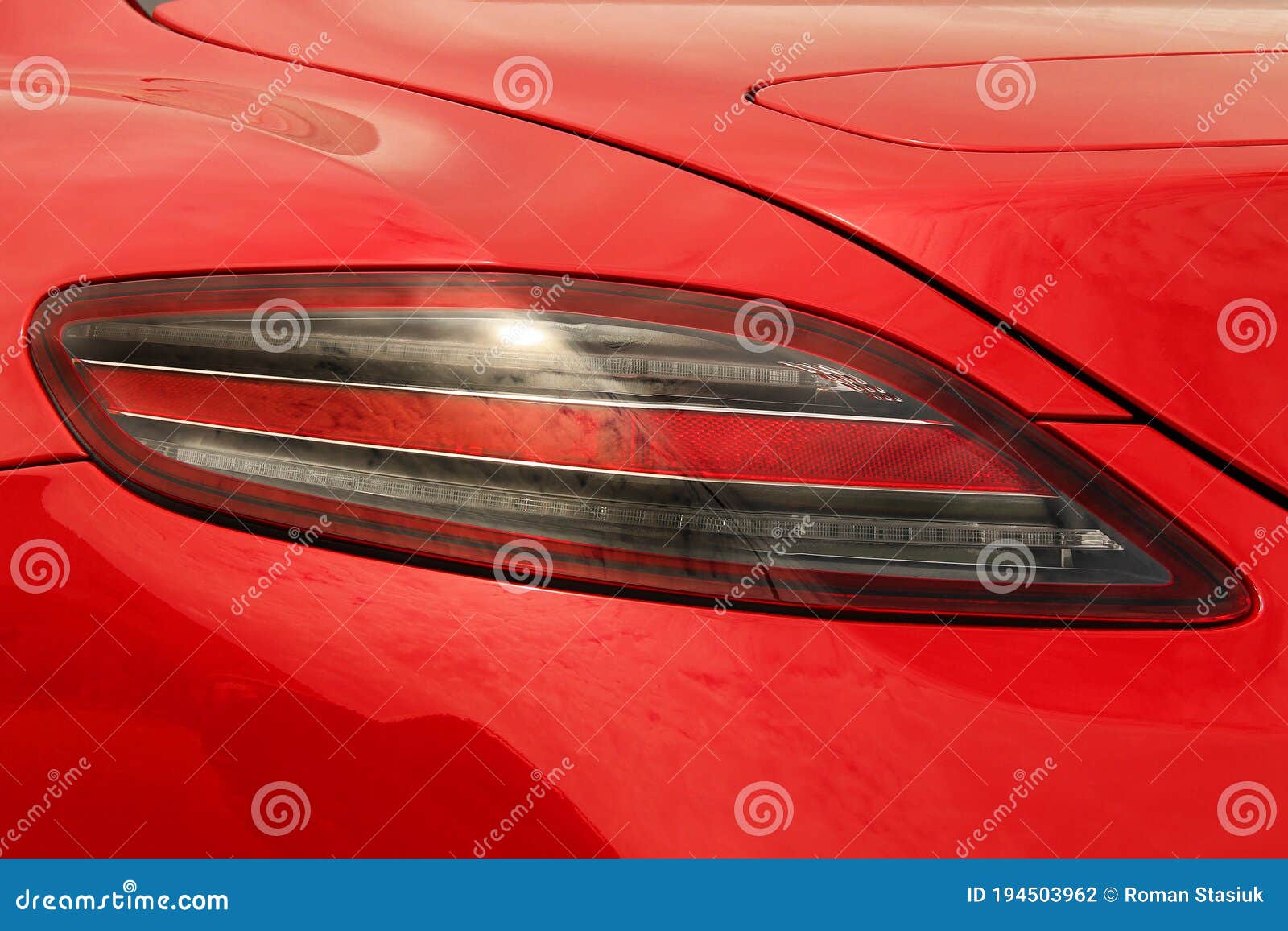 Car Headlights. Luxury Headlights. Part of a Red Car Close Up Stock Photo Image of transport