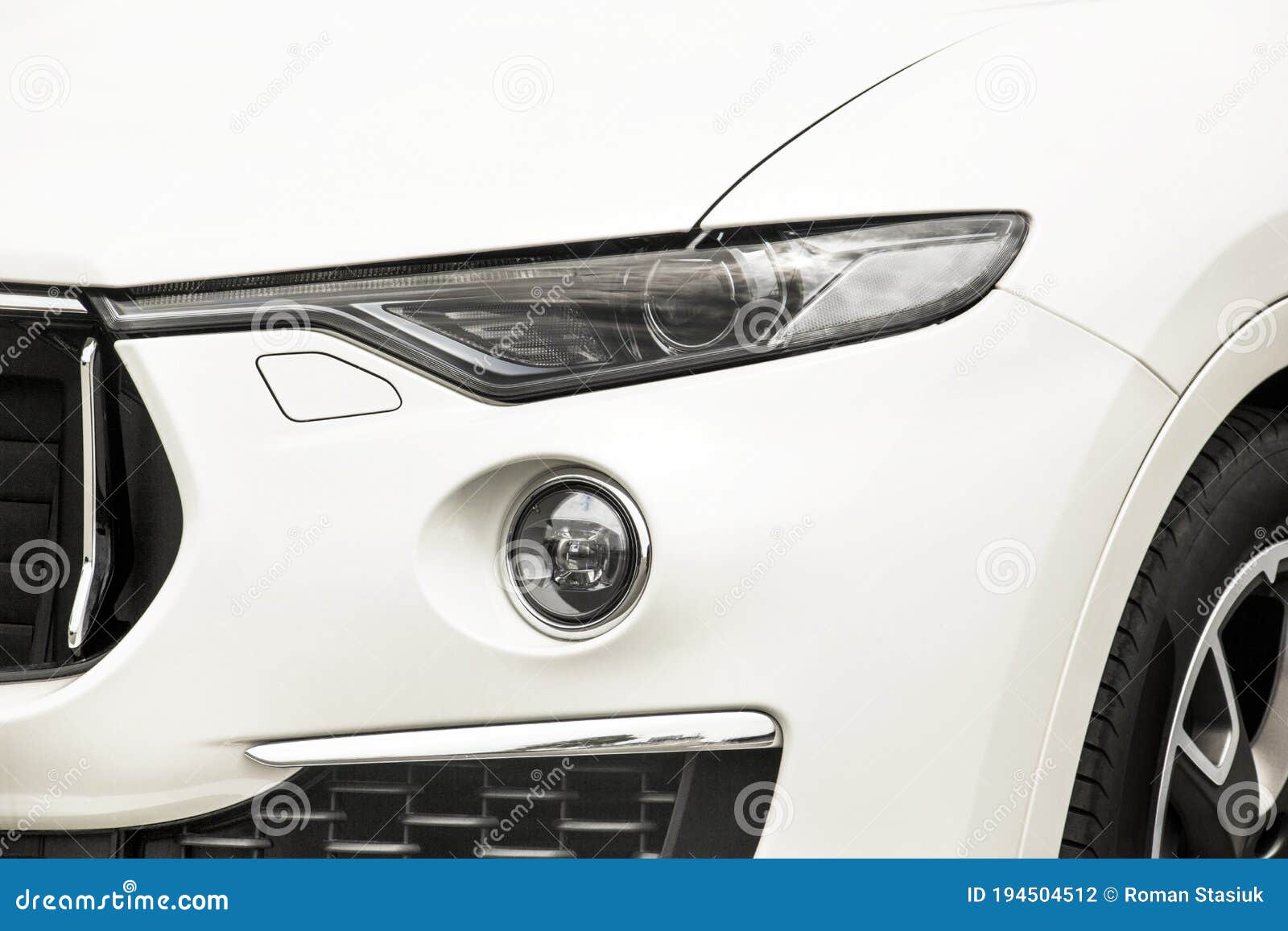 Car Headlights. Part Of The Car In The Shade. Luxury Headlights Royalty