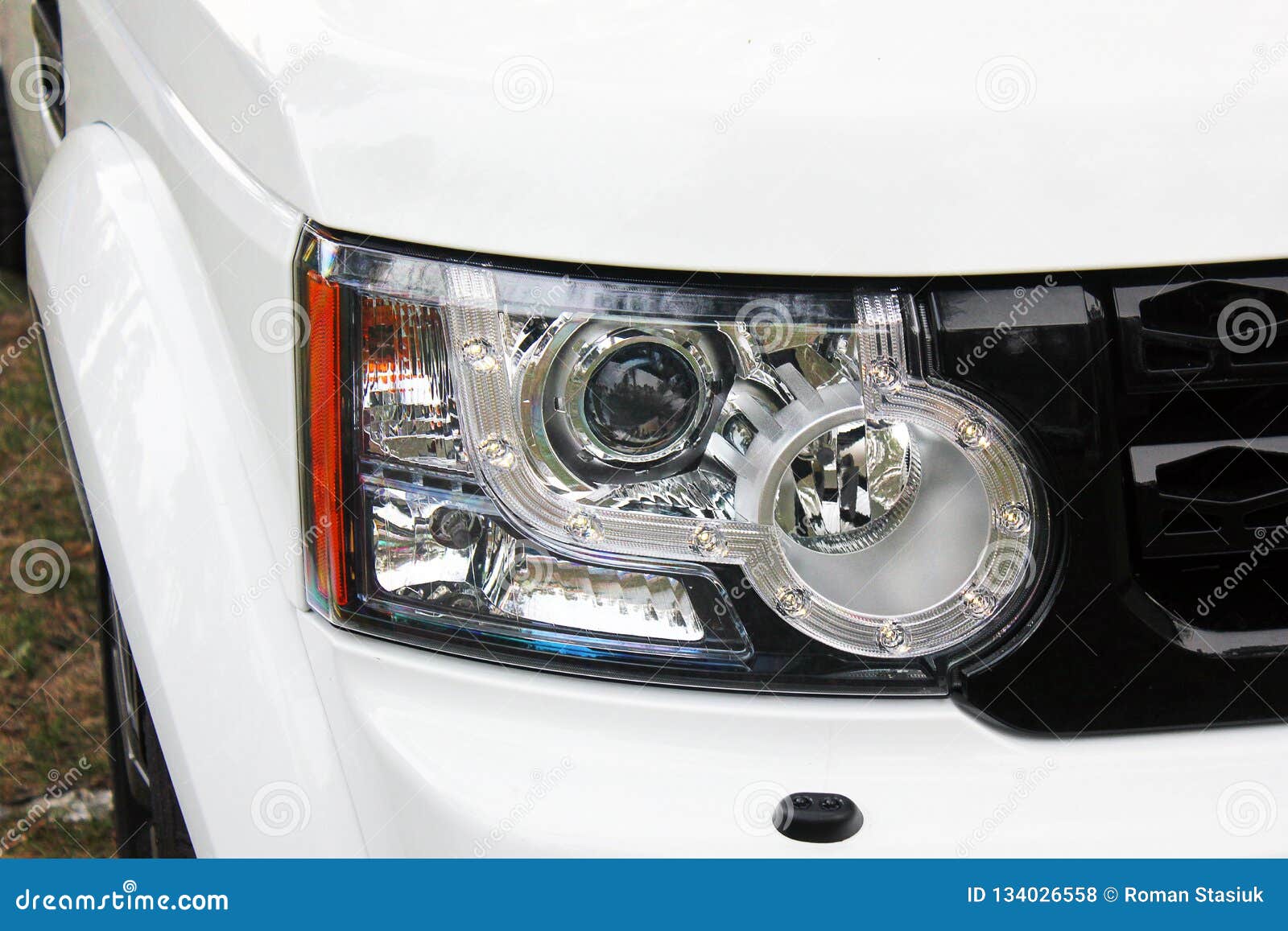 Car Headlights. Luxury Headlights. Car. White Car Stock Photo Image