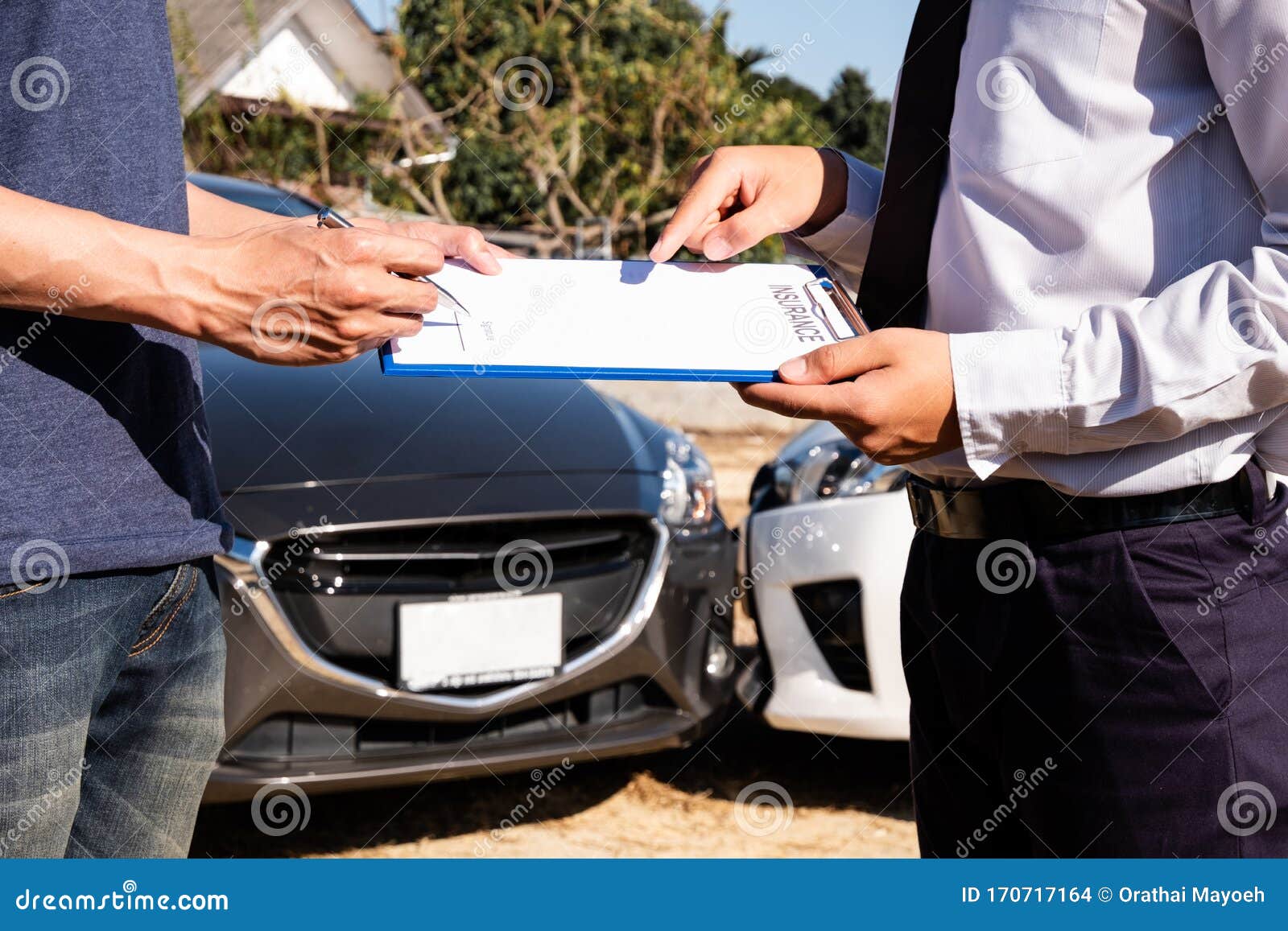 The Car Insurance Agent Is Checking The Accident Spot. Of