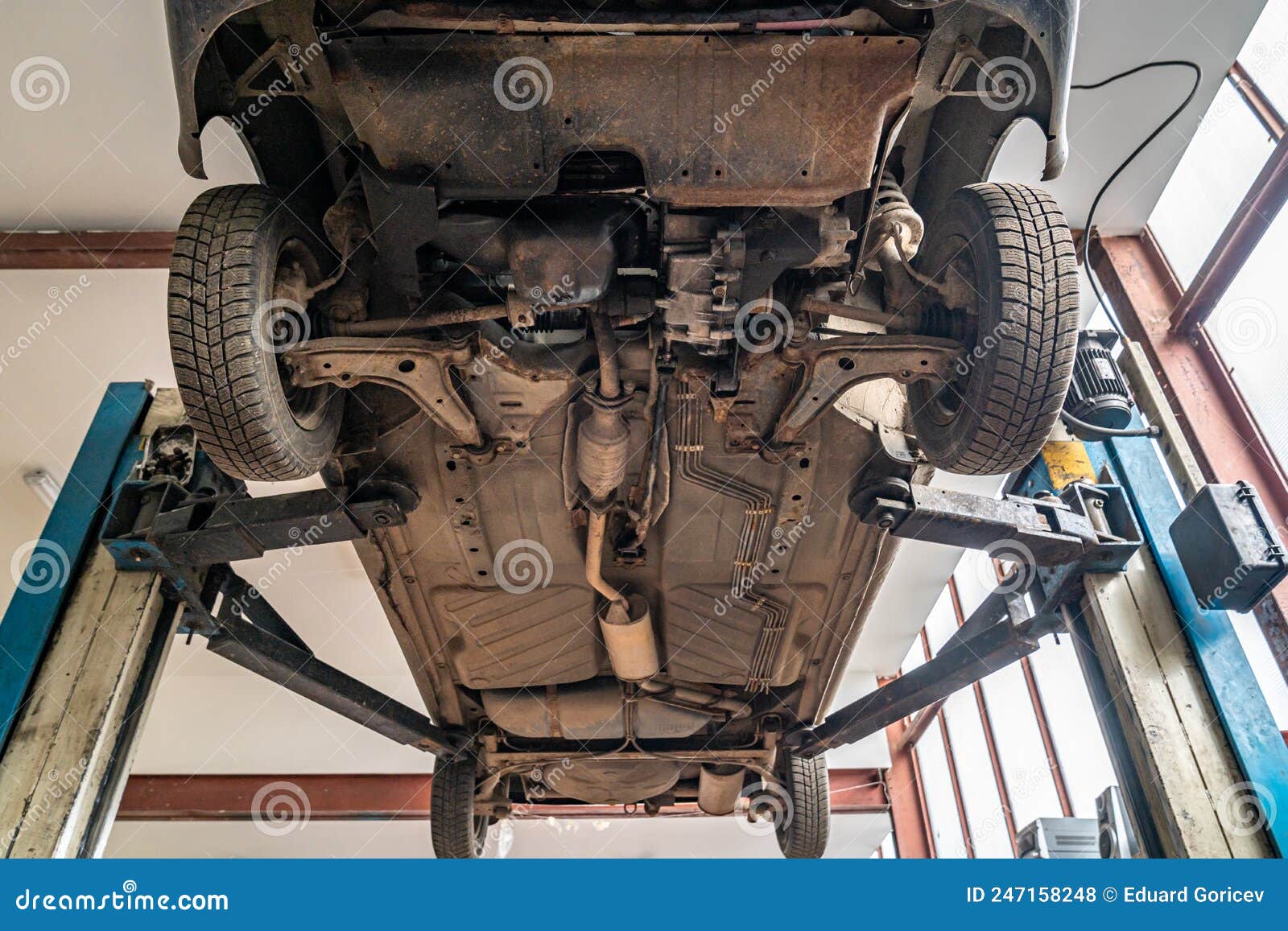 Car on Jack during Repair in Service Stock Photo Image of maintenance, automotive 247158248