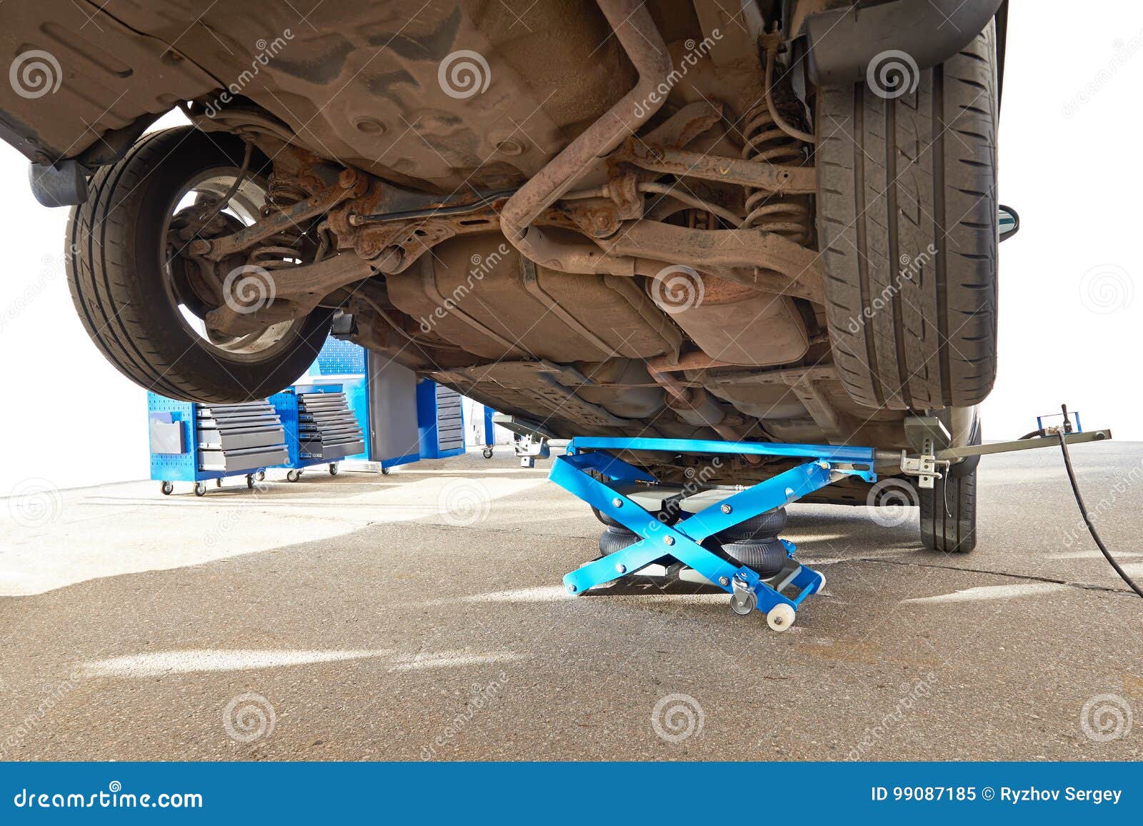 Car Lifted by Pneumatic Jack Isolated Stock Image Image of industry