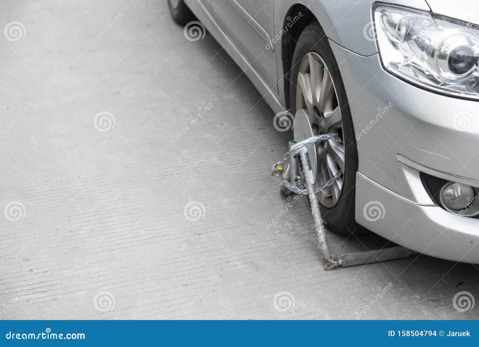 The Car is Locked Wheels Due To Parking in a Prohibited Place Stock