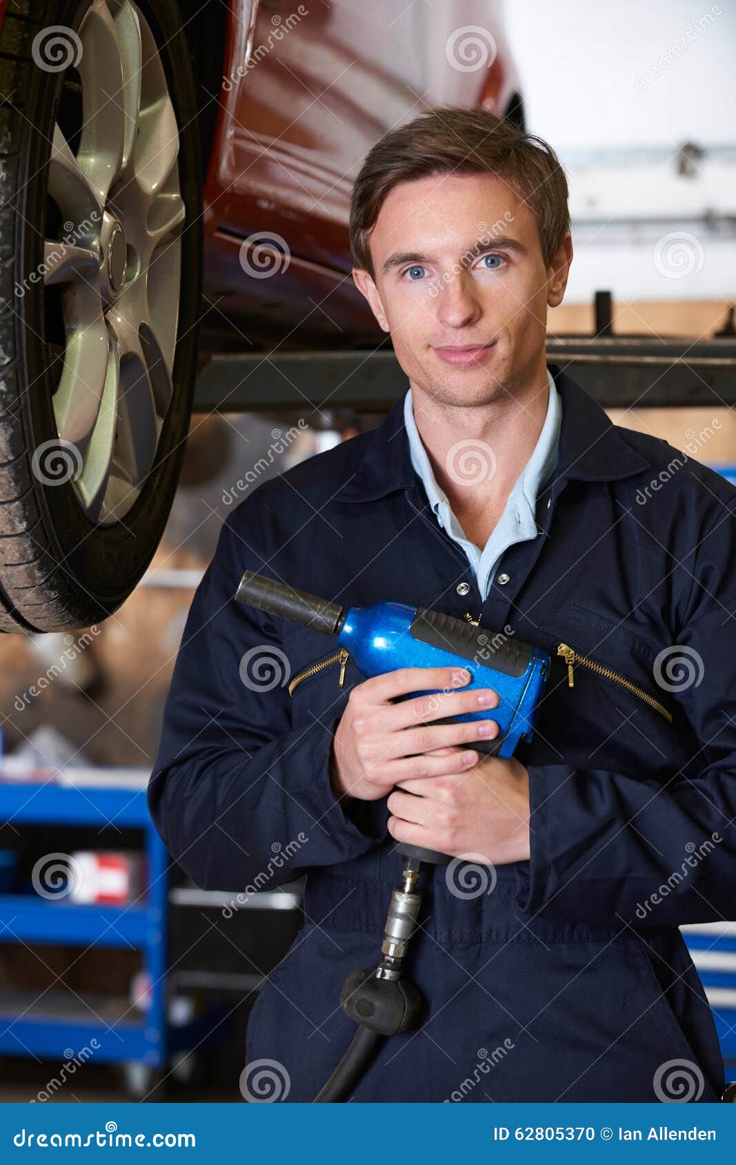 Car Mechanic Holding Air Hammer Stock Photos Free & RoyaltyFree