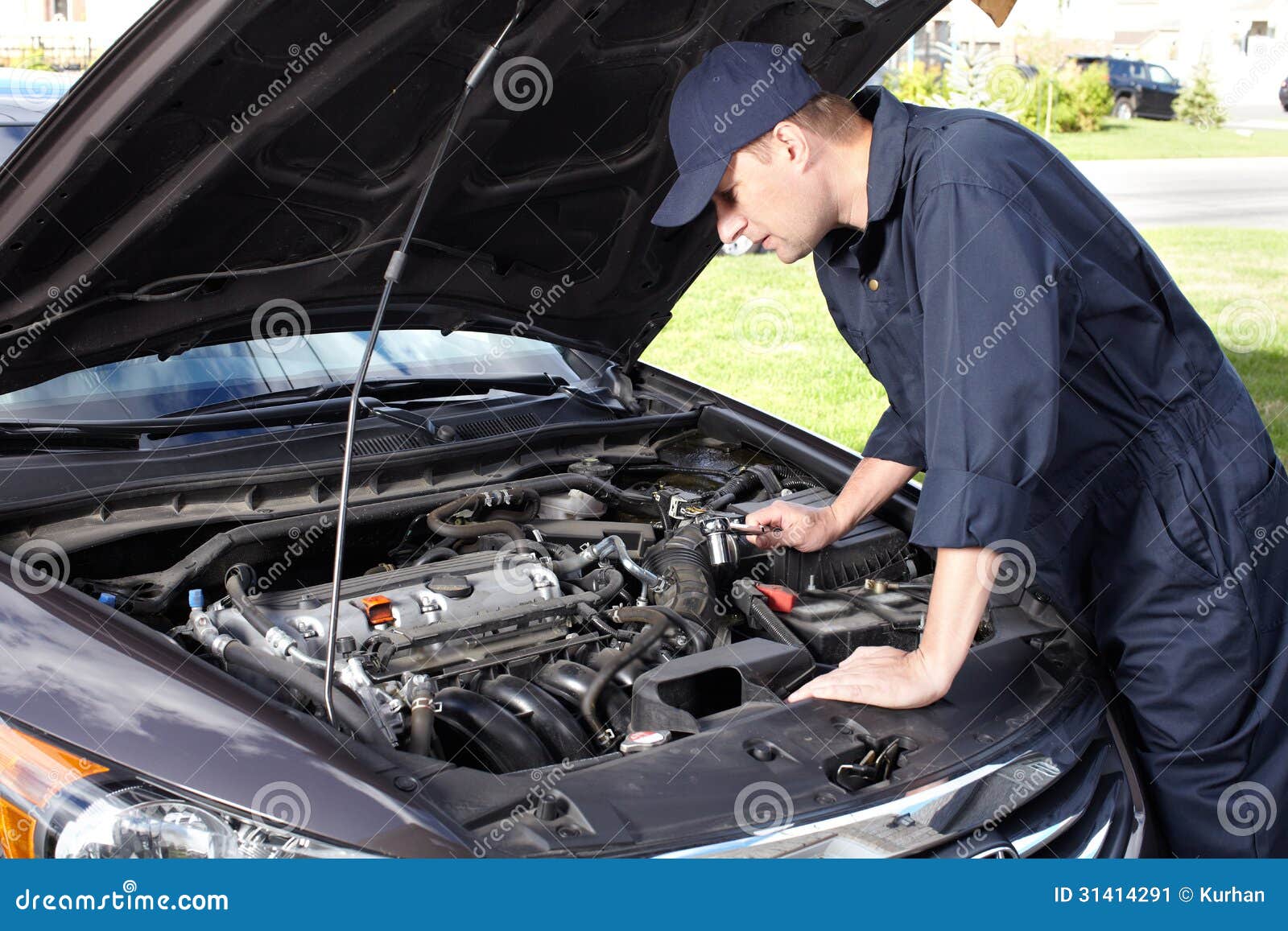 car mechanic working in auto repair service.