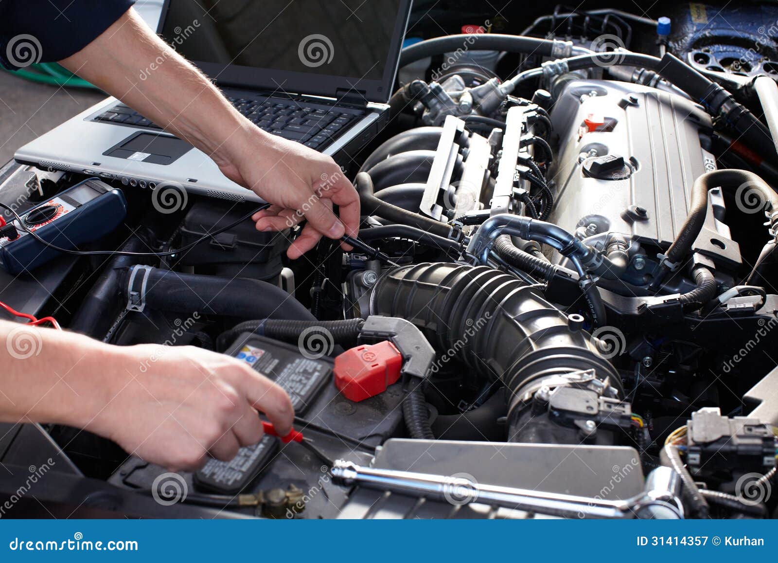 car mechanic working in auto repair service.