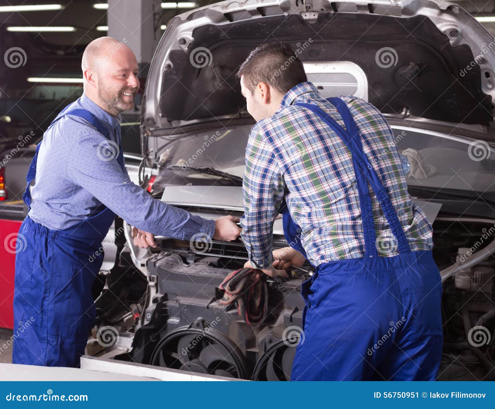 Car Mechanics Working at Stock Image Image of indoors