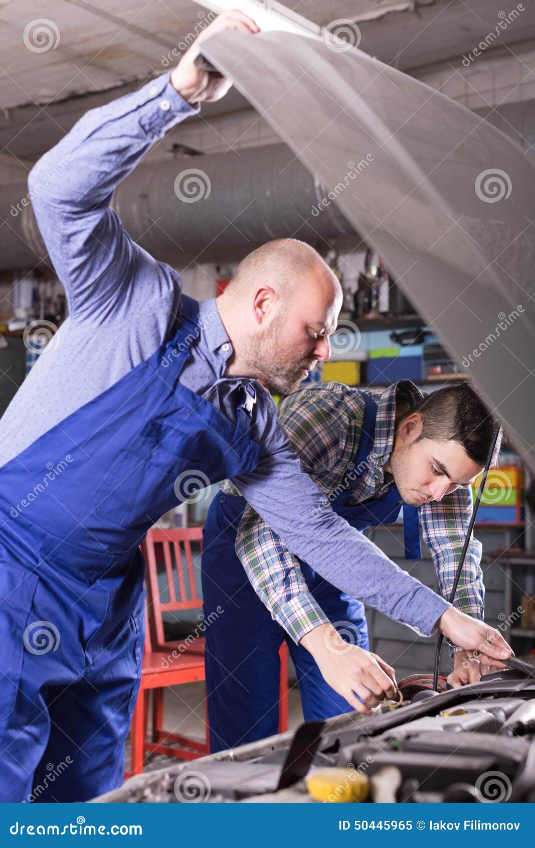 Car Mechanics Working at Stock Image Image of professional