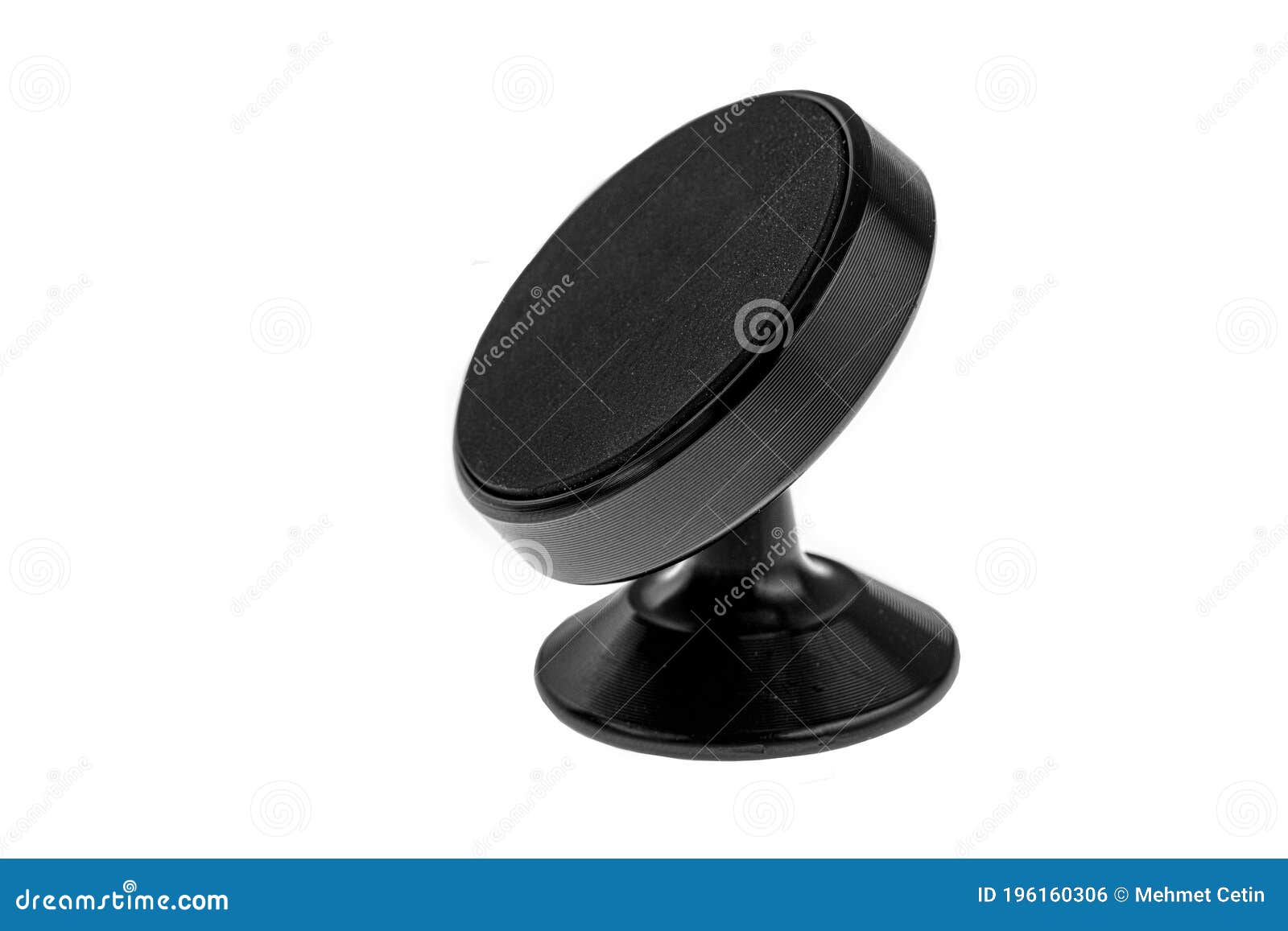 A Black Plastic Mobile Phone Holder with a Magnetic Fixture with