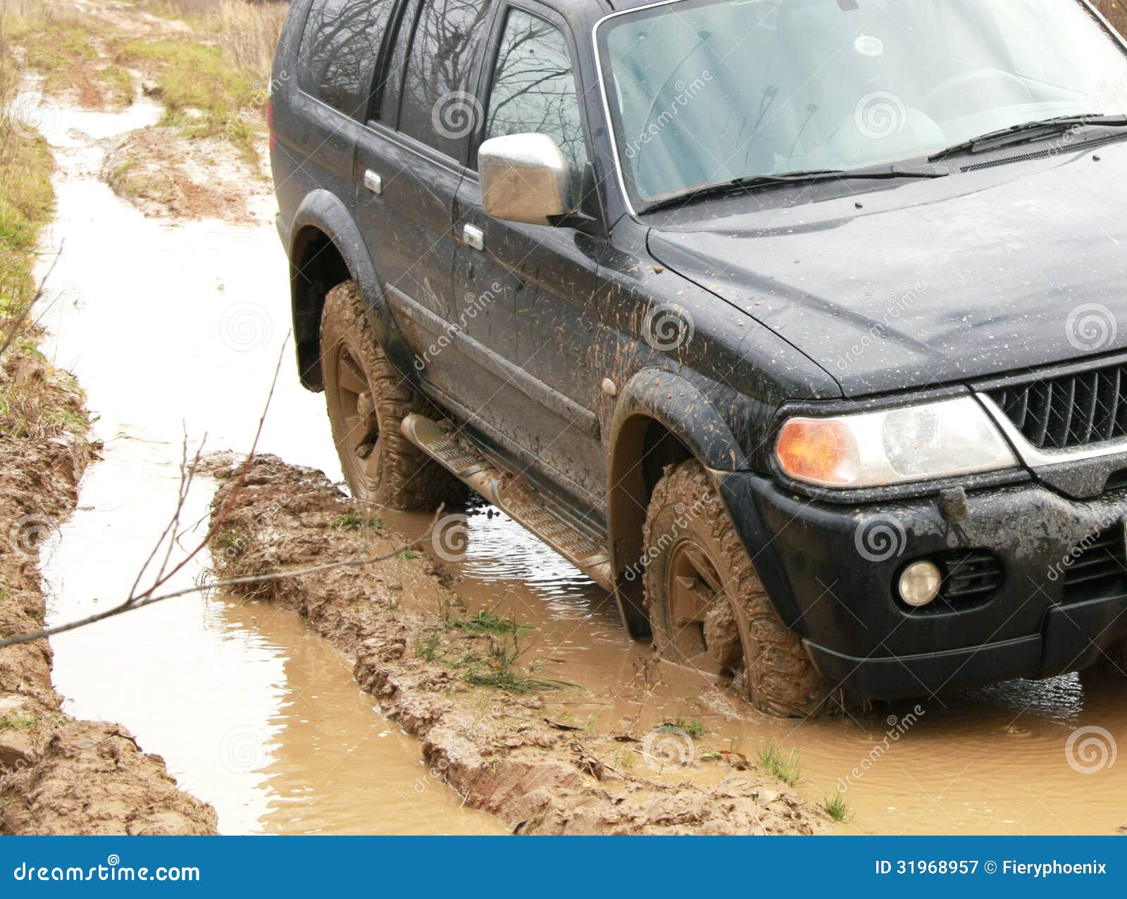 Car in Mud in the Forest, Offroad Stock Image Image of grass, buried