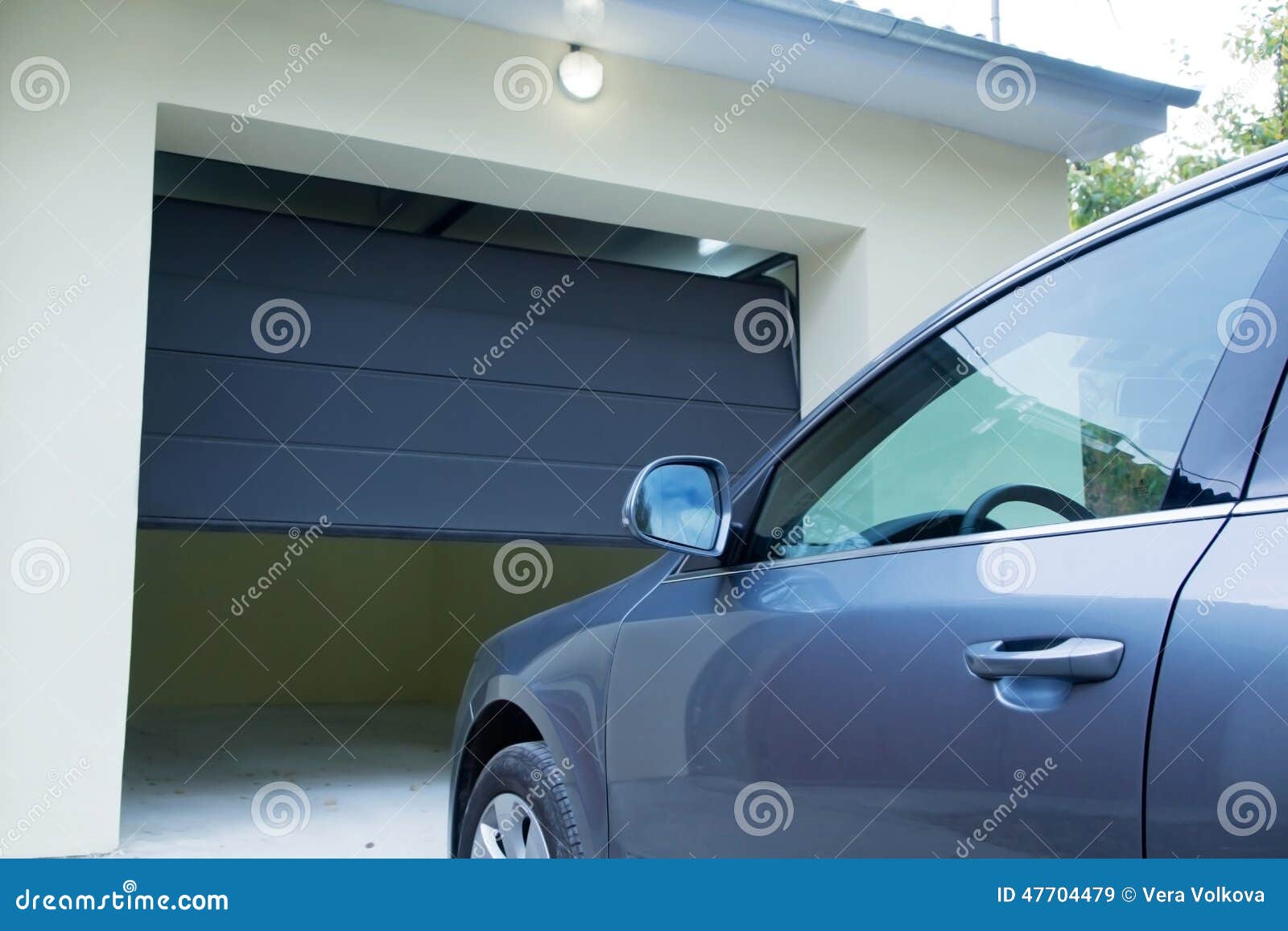 car near the automatic garage door