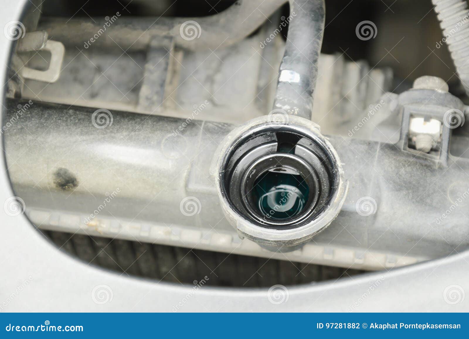 Car Radiator Open Cover and Checking Water Level for Safety Stock Photo
