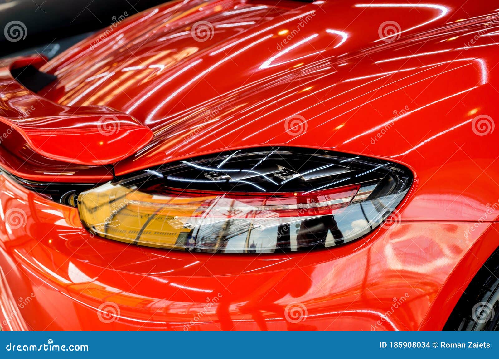 car service worker applying nano coating on a car detail