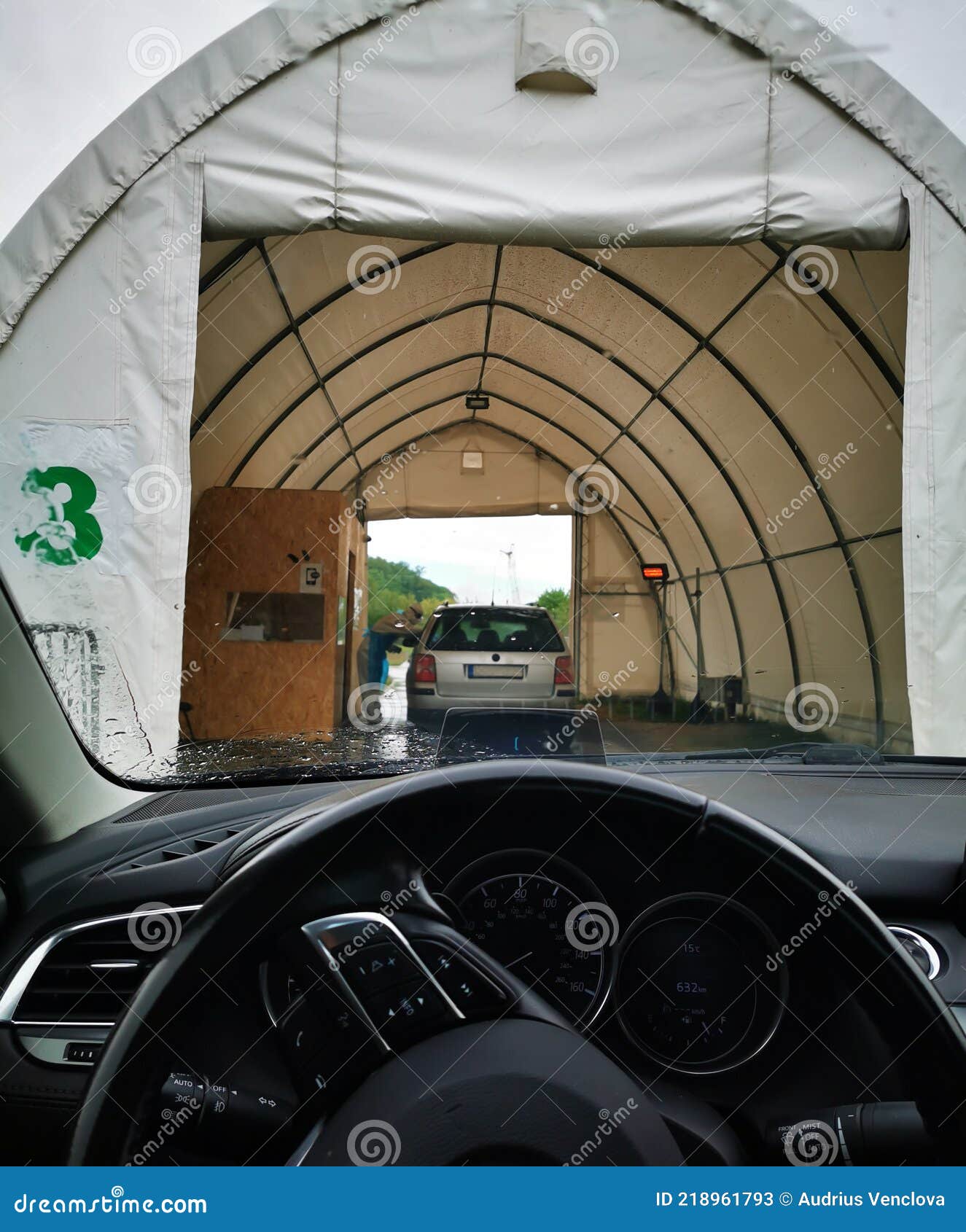 Car Standing in Front of Covid19 Drive through Testing Center Stock