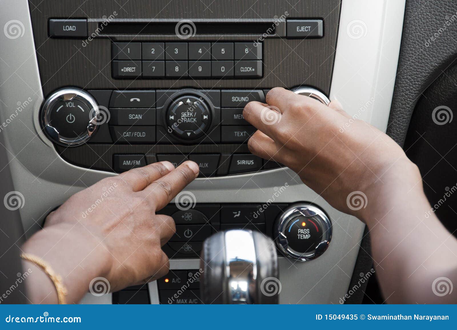 Car stereo stock image. Image of music, dial, hand, buttons 15049435