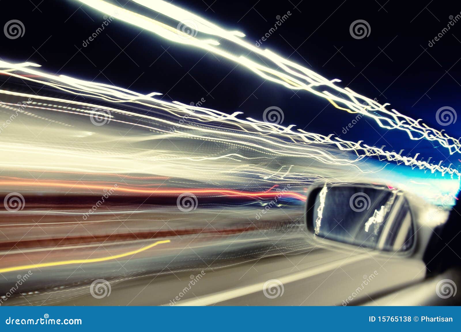 car streaks of light in tunnel