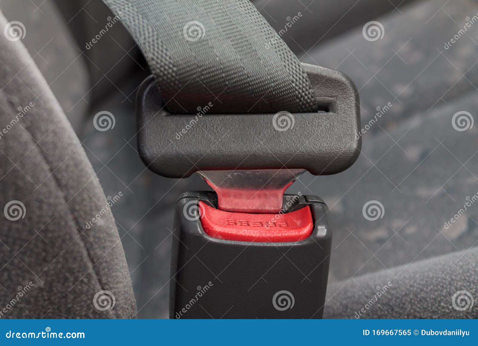 car three-point safety belt, buttoned, the concept of road safety, life and health of the driver and passengers