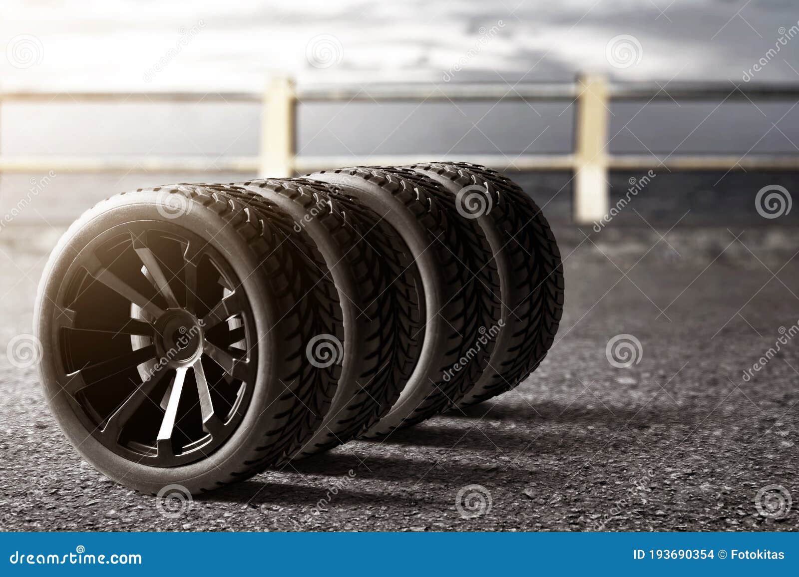 Car tires on the streets stock photo. Image of automotive 193690354