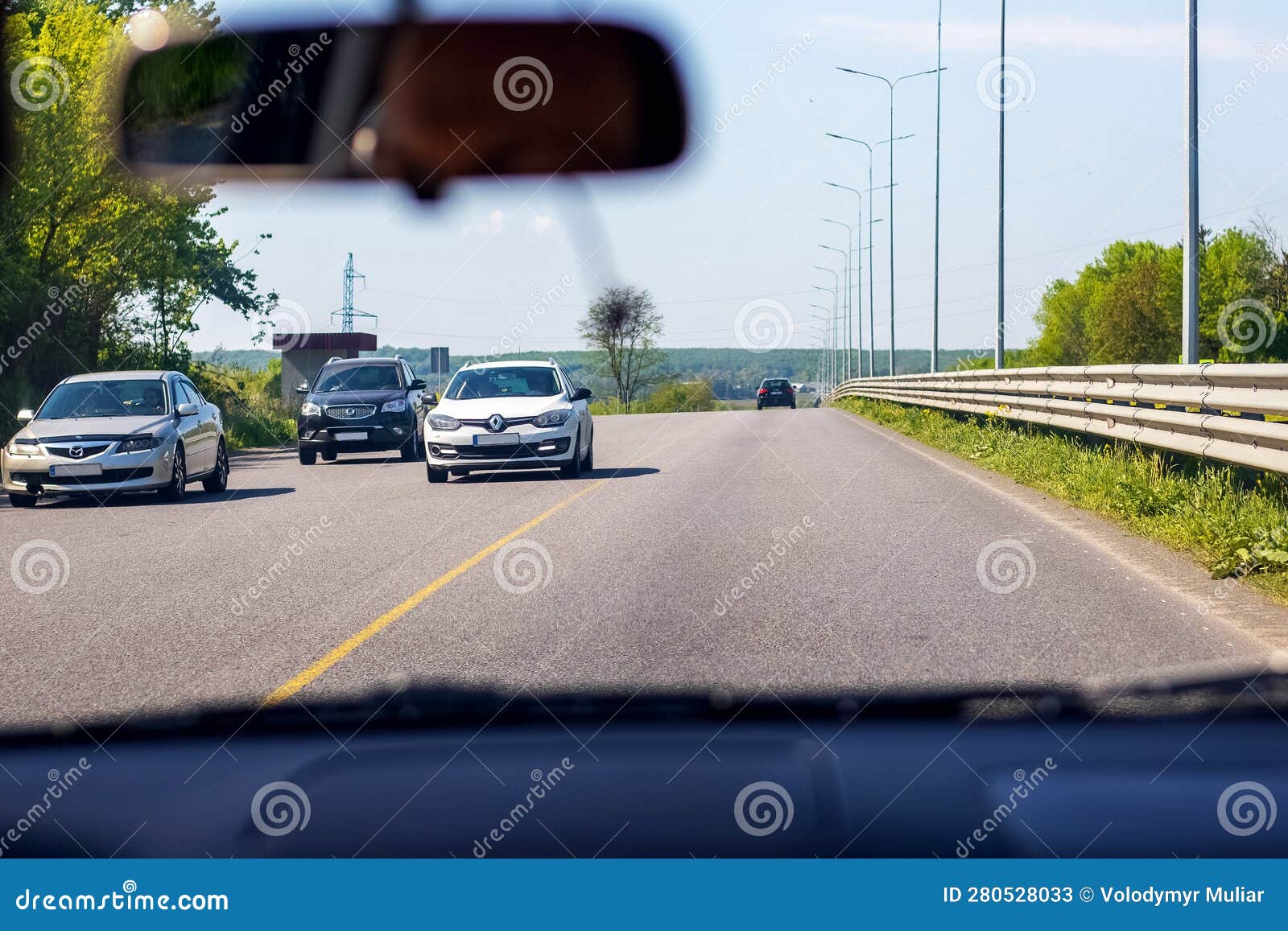 Car Traffic on the Highway, View from the Car Interior Stock Image