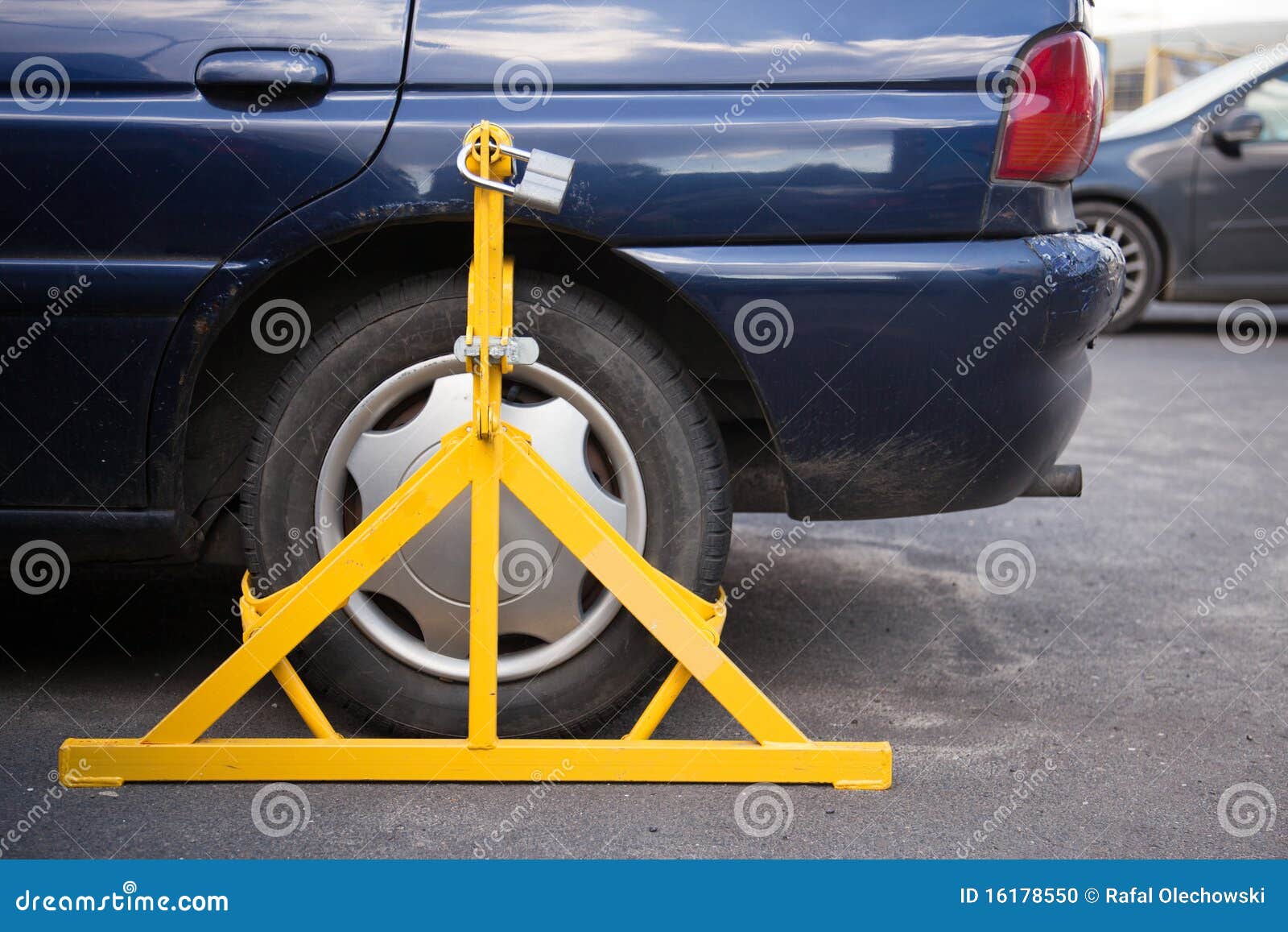 Car wheel clamped stock photo. Image of penalty, rules 16178550