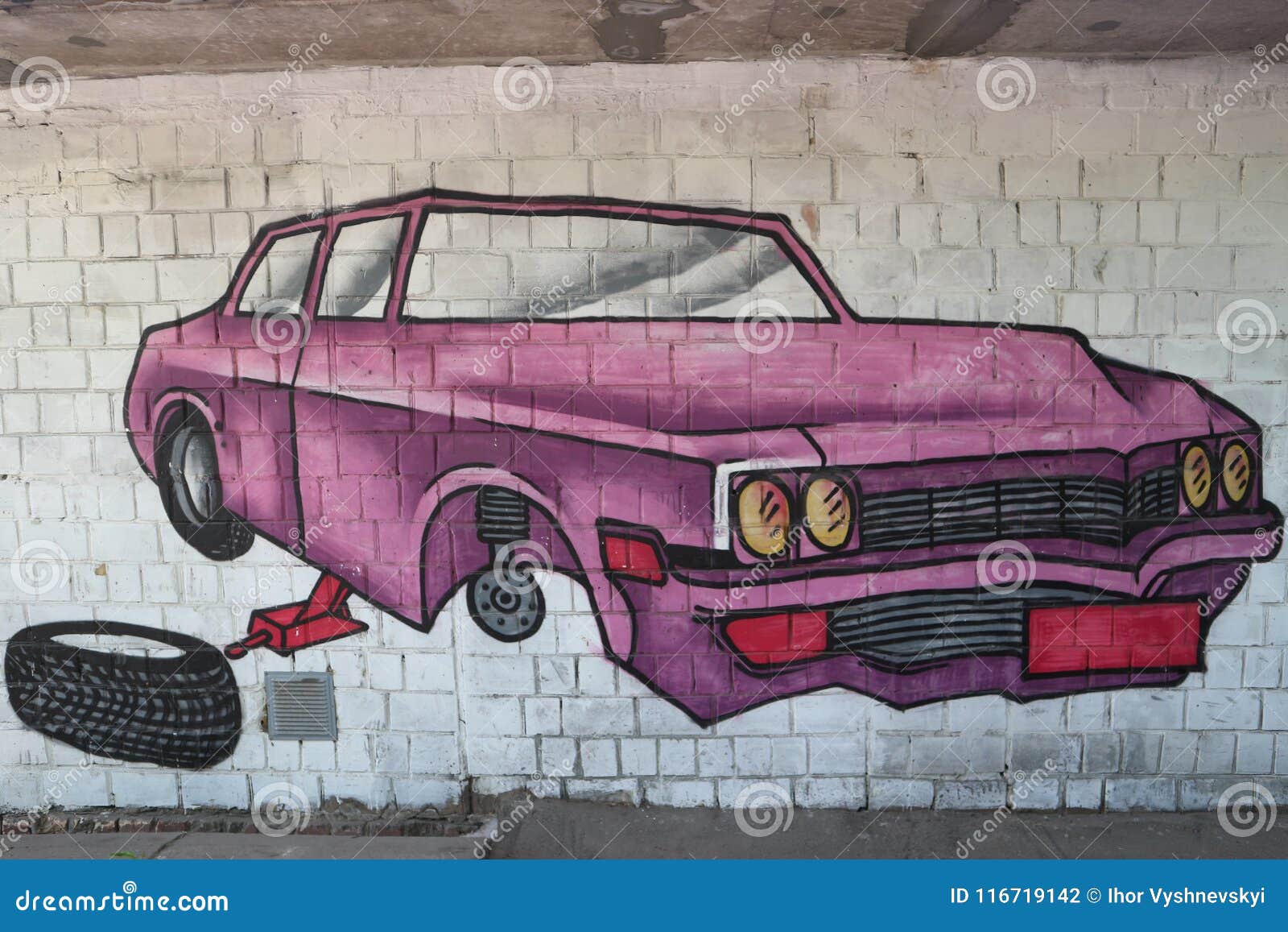 Car without Wheel in the Repair Graffiti on the Wall Editorial Photography Image of force
