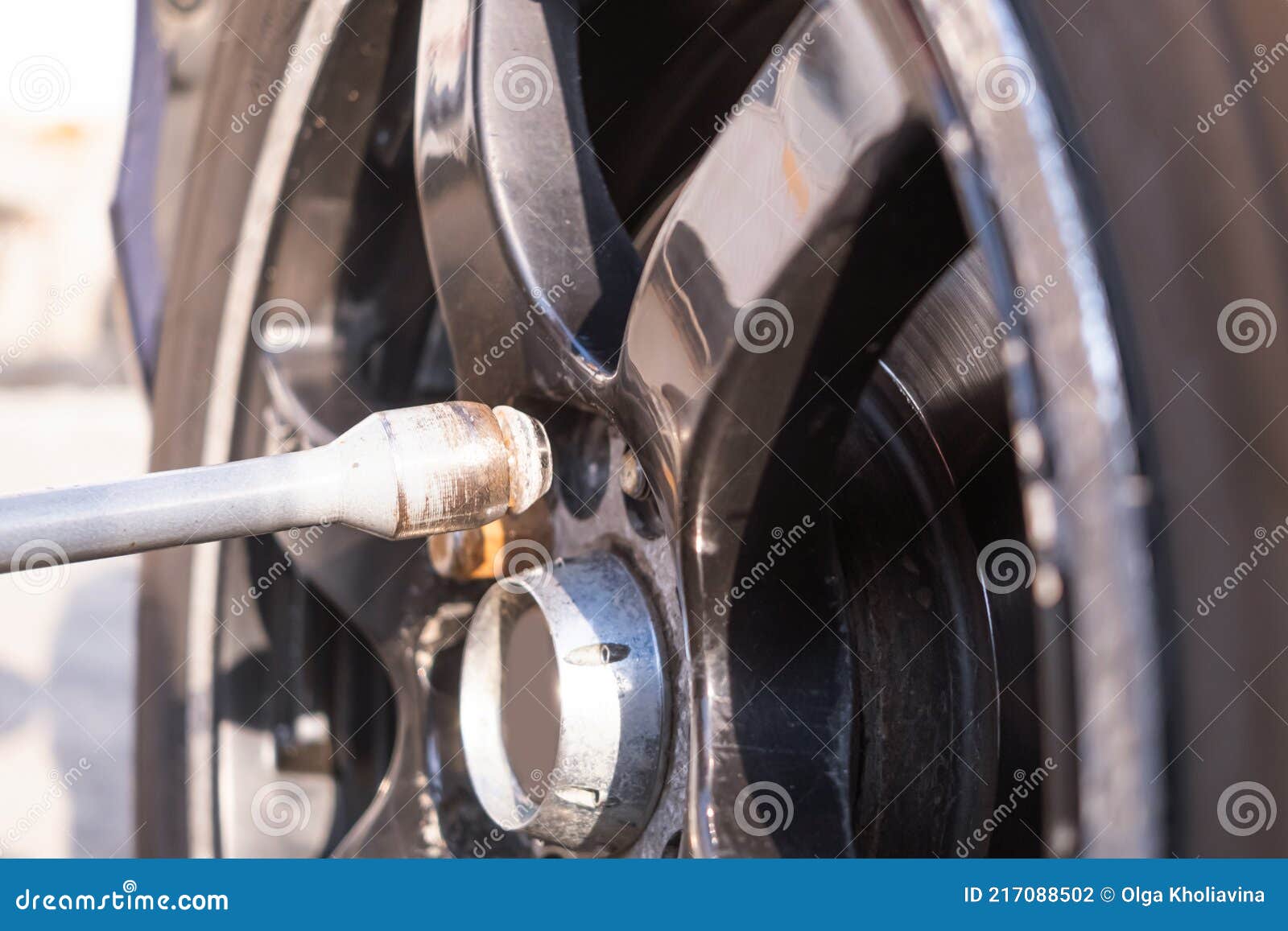Car wheel replacement. stock photo. Image of fitting 217088502