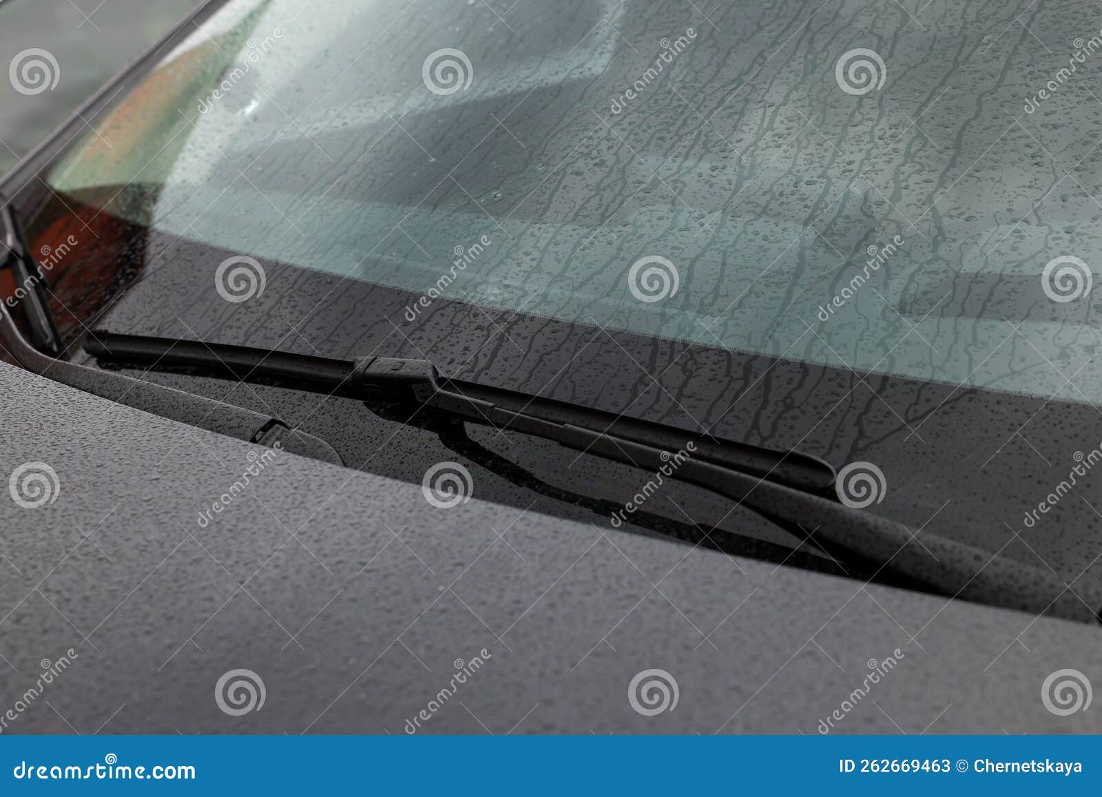 Car Wipers Cleaning Water Drops from Windshield Glass, Closeup Stock
